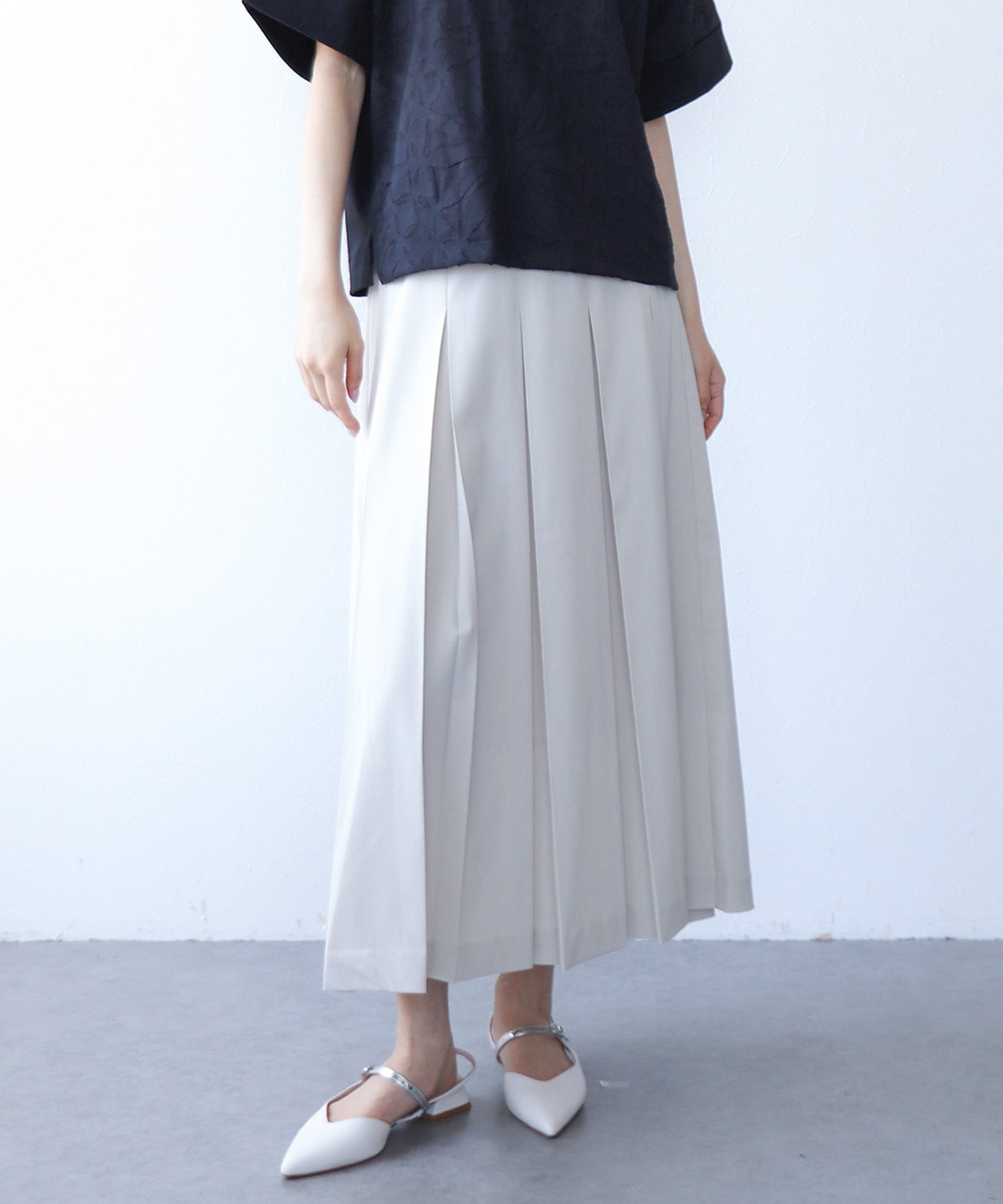 クールドライタッチタックスカート | AND ON JIONE STORE（アンドオン