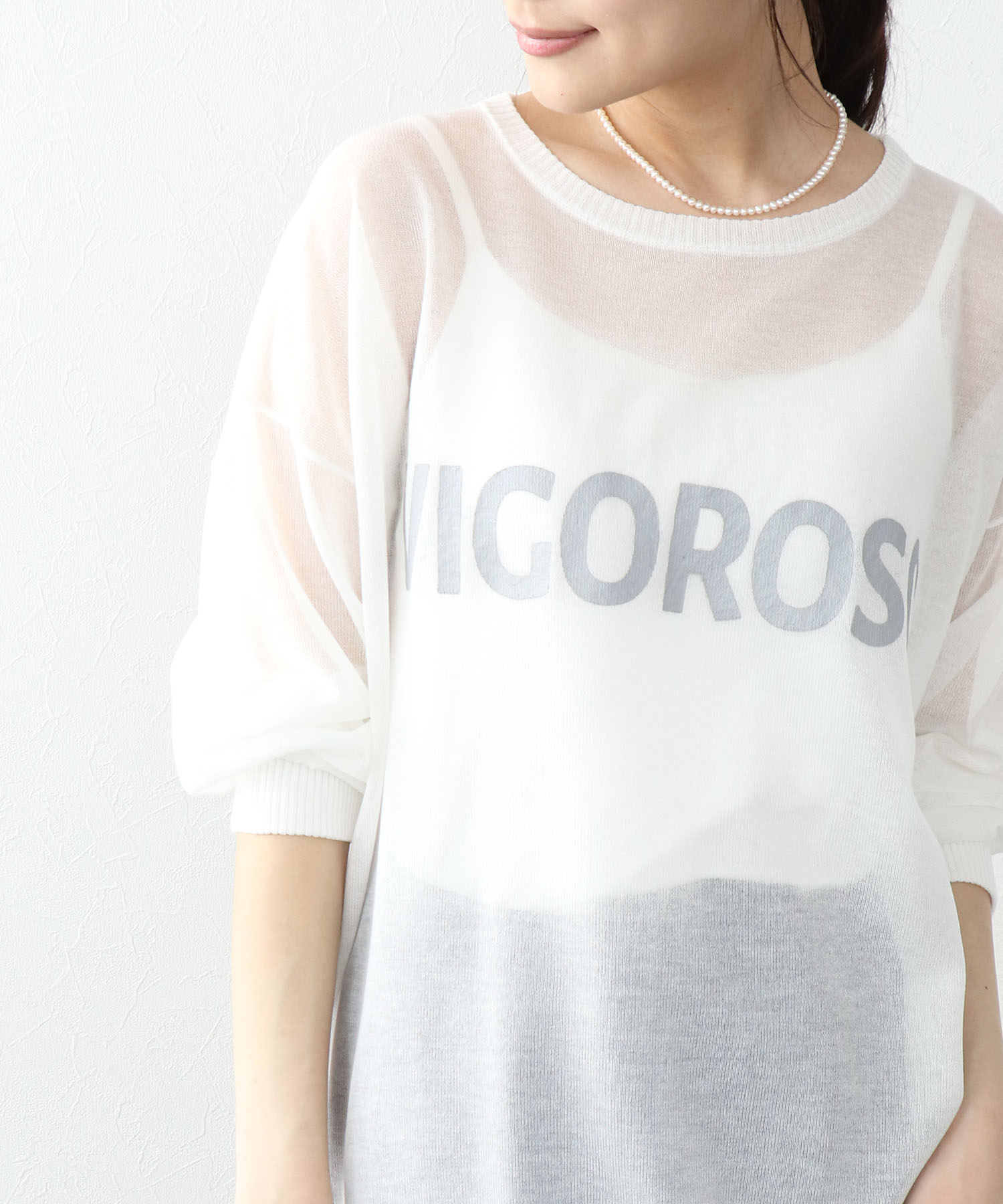 ロゴプリントシアーニット