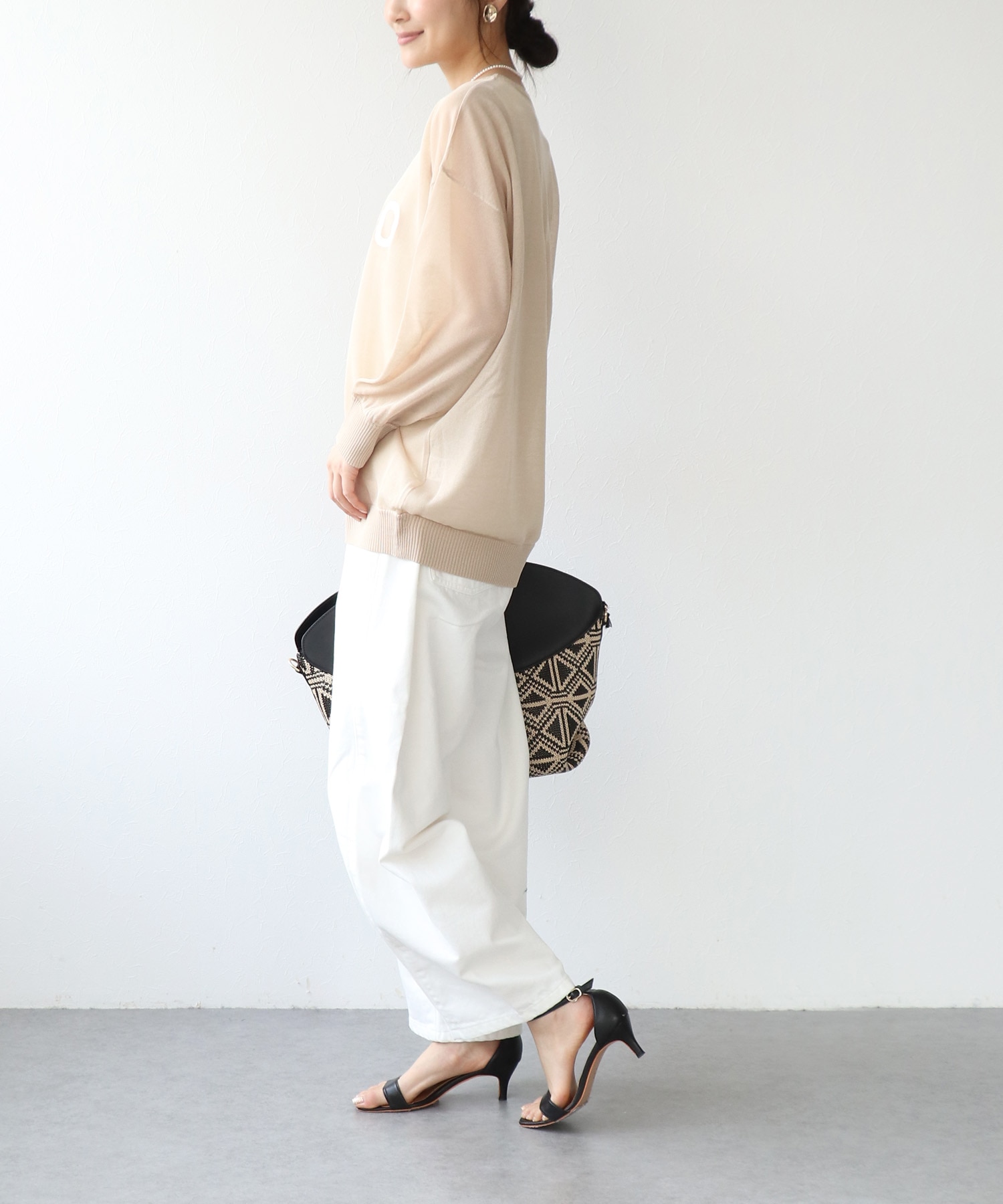 ロゴプリントシアーニット