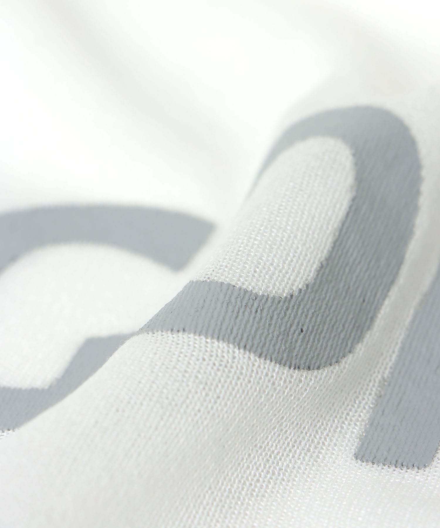 ロゴプリントシアーニット