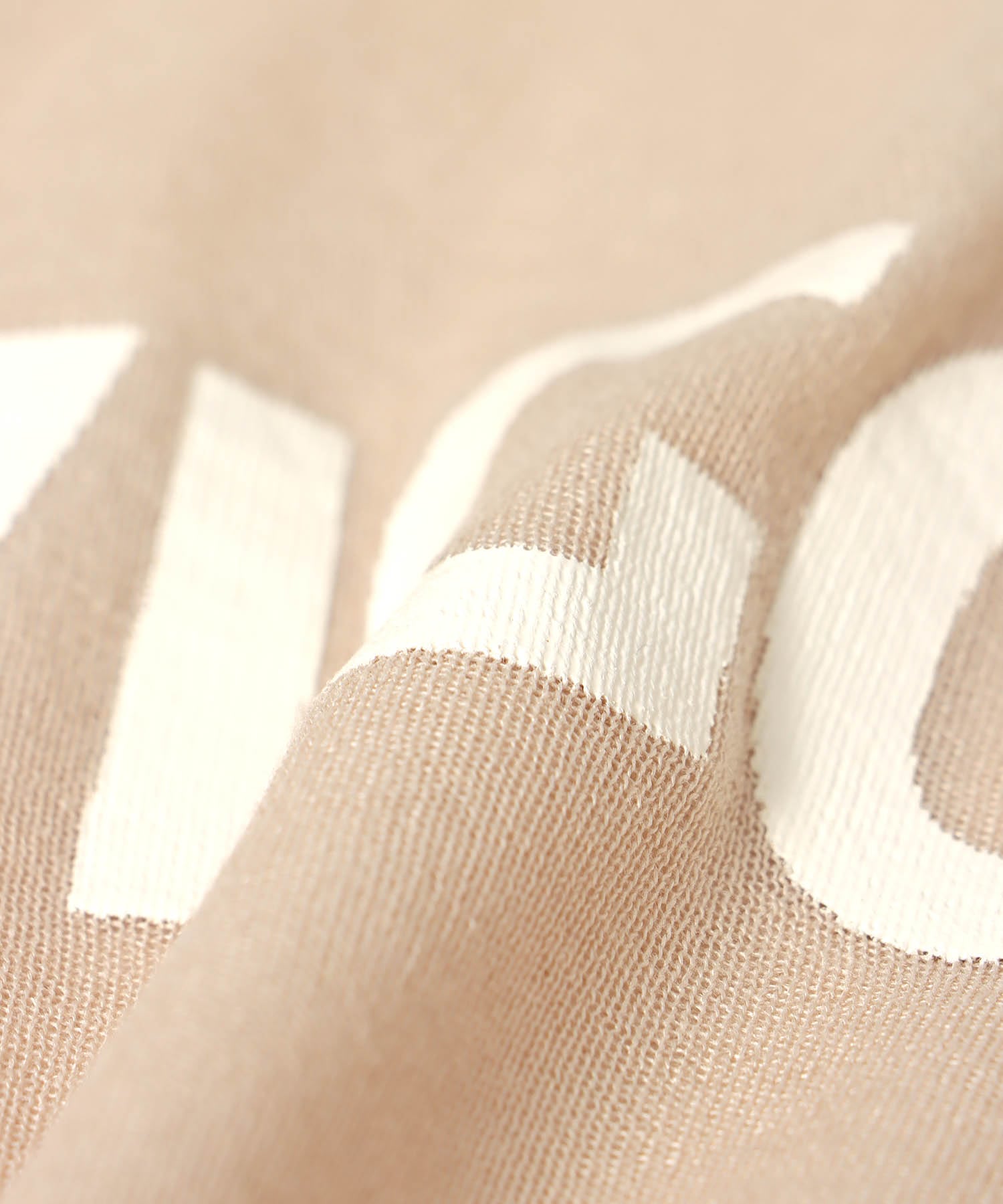 ロゴプリントシアーニット