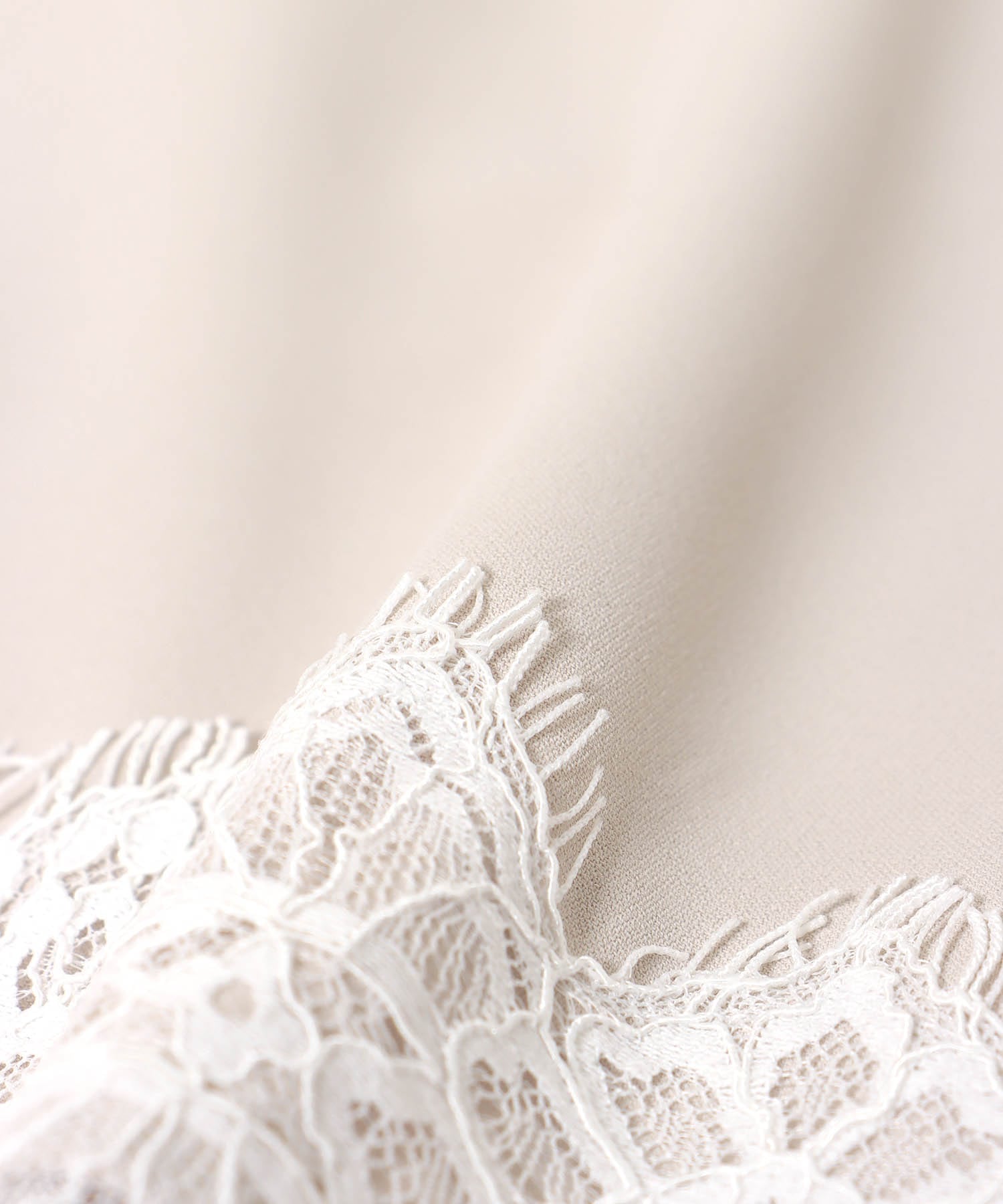 ヘムフレアーブラウス