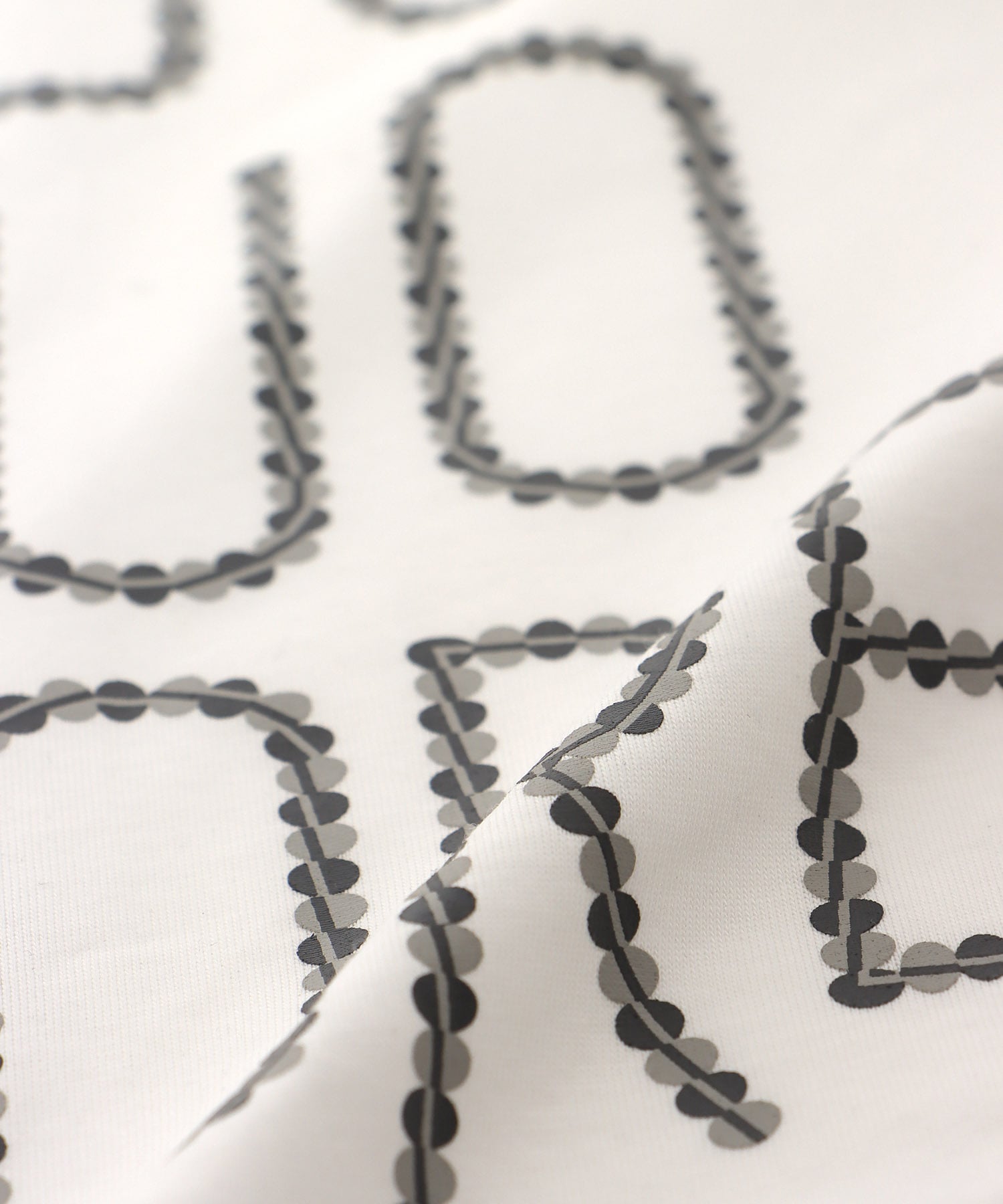 バックファスナーロゴTシャツ