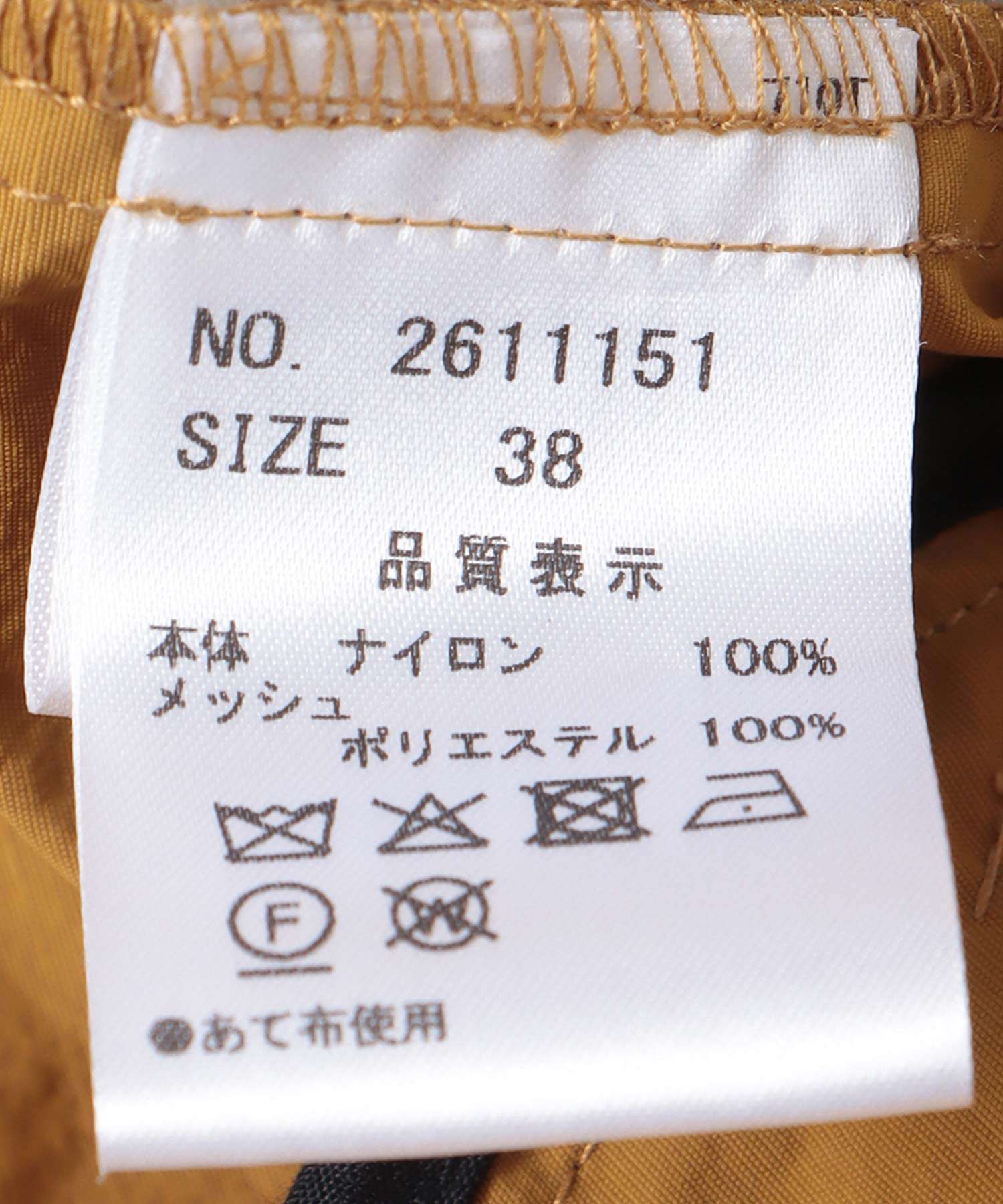 テントラインショート丈トレンチコート