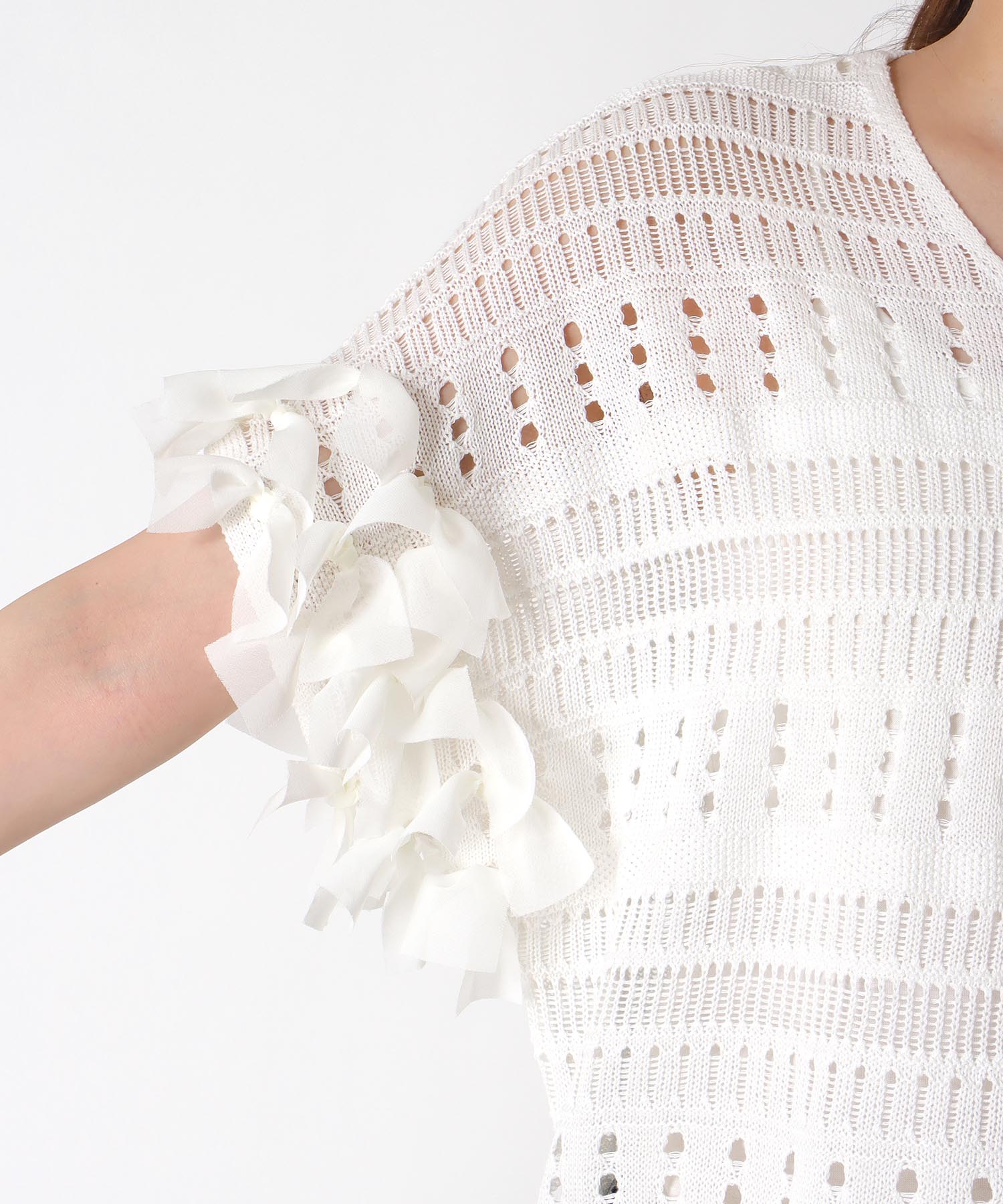 透かし柄袖リボントップス