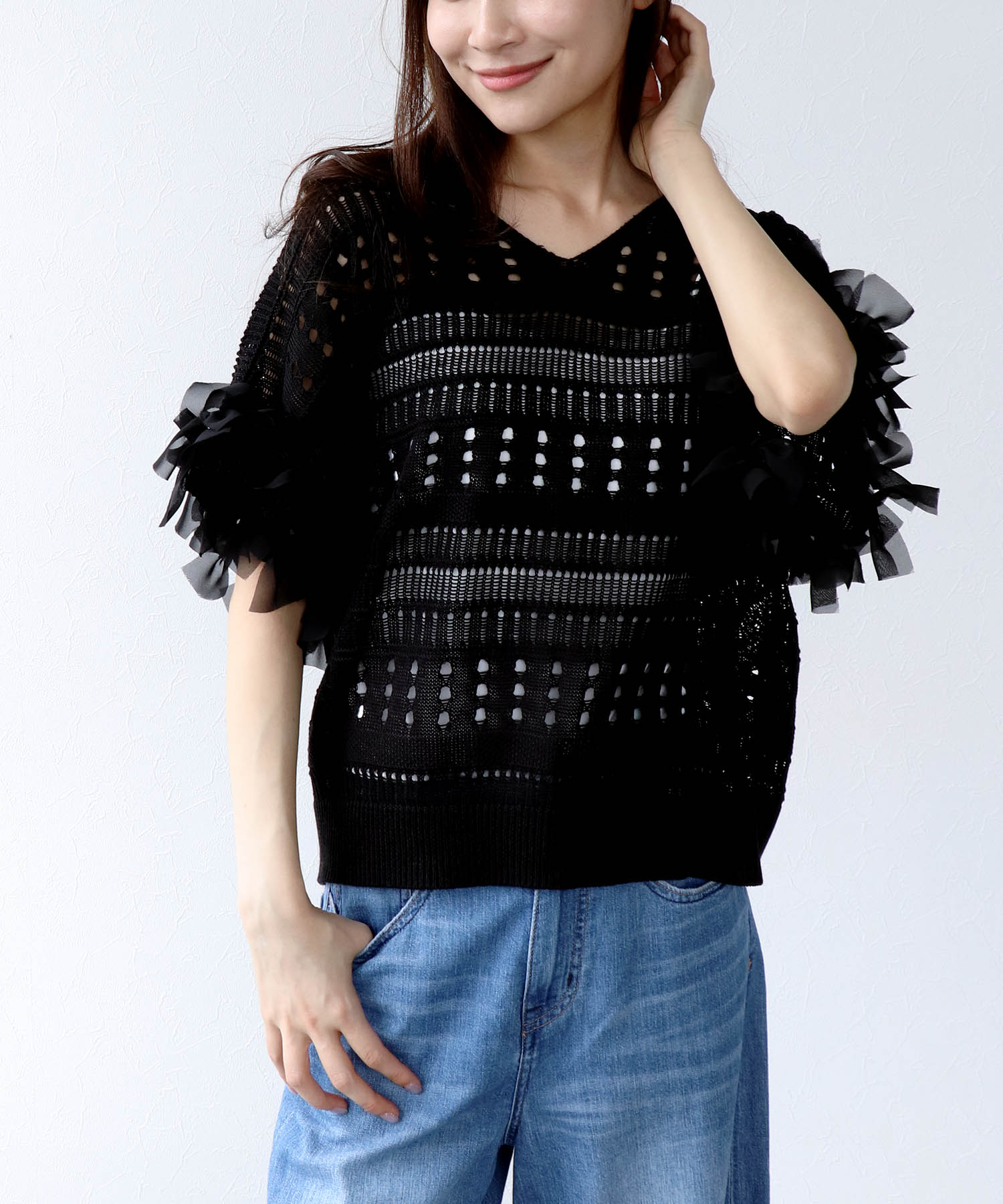 透かし柄袖リボントップス