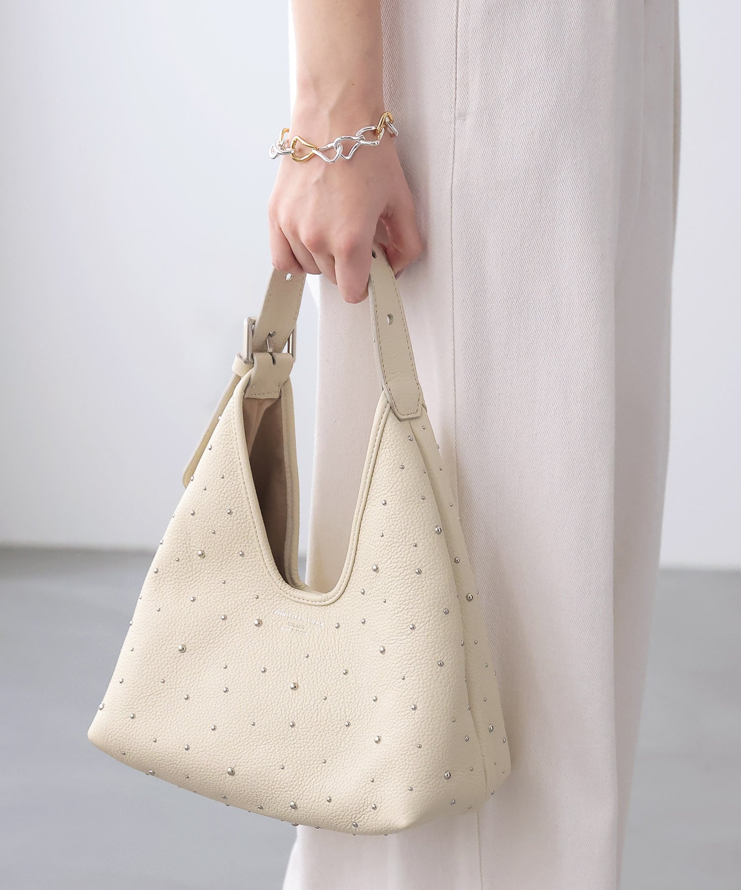 ホワイトスタッズトラペーズminiバッグ【クリスチャンヴィラ/CHRISTIAN VILLA】