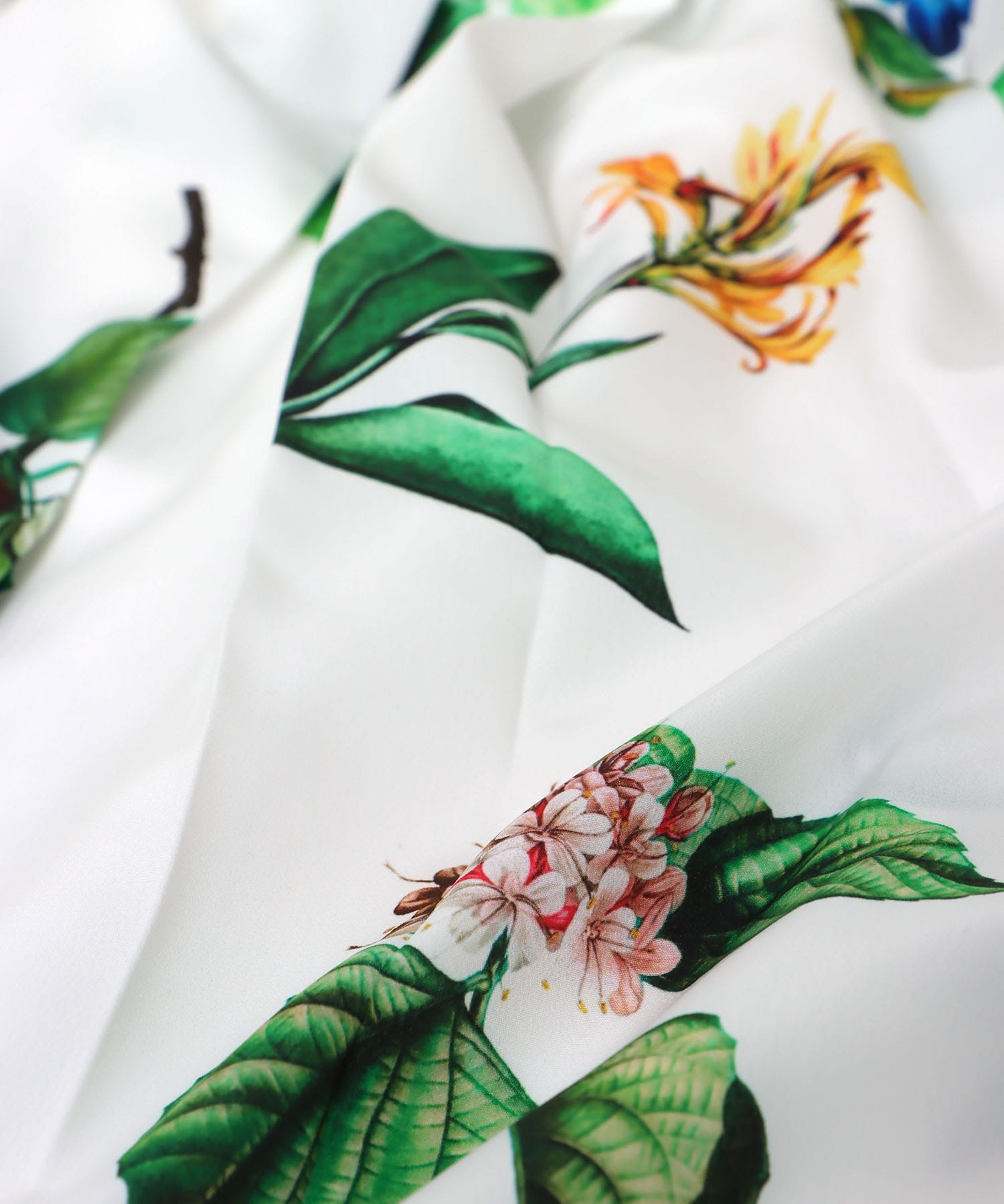 ボタニカルプリントプリーツスカート