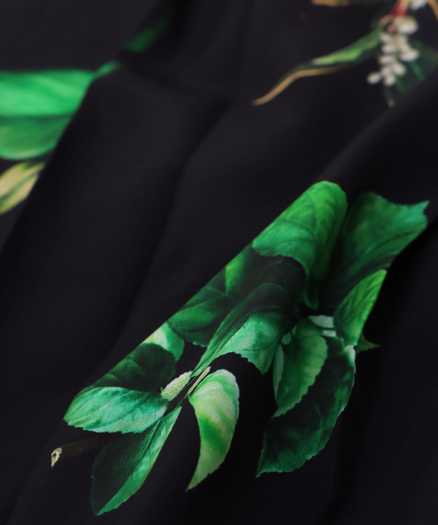 ボタニカルプリントプリーツスカート