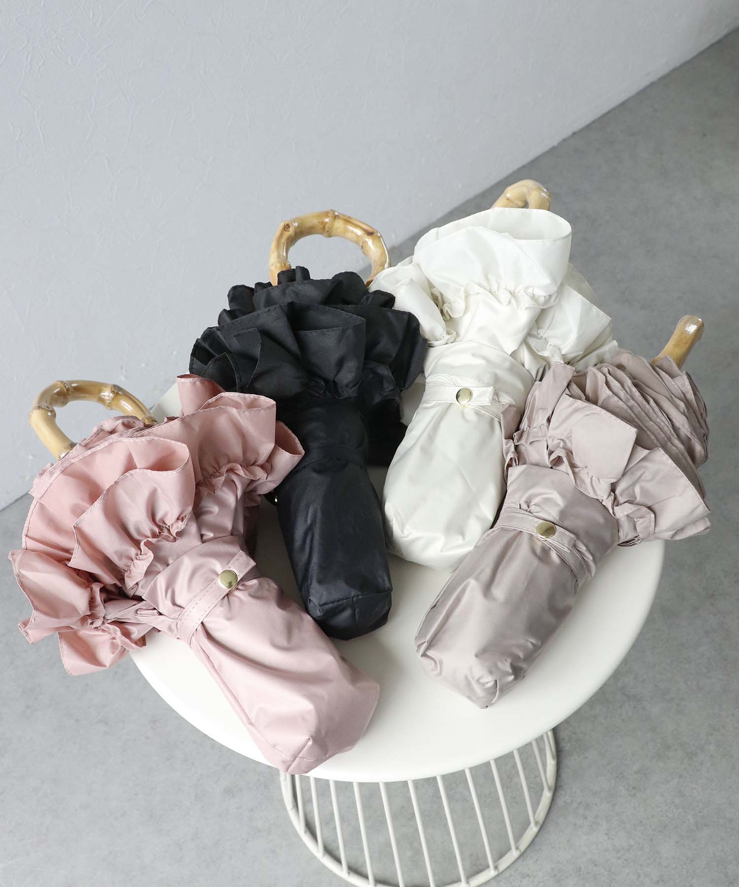 【pink trick / ピンクトリック】フリル完全遮光折傘（晴雨兼用）