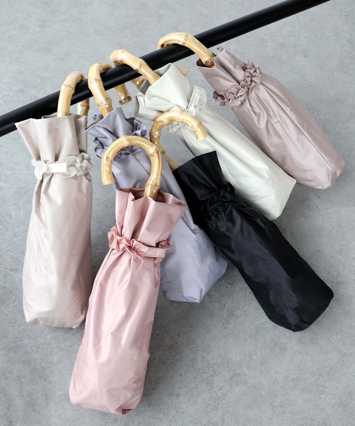 [CP日除け10%]【WEB限定】【pink trick】フリル完全遮光2段折傘(晴雨兼用)