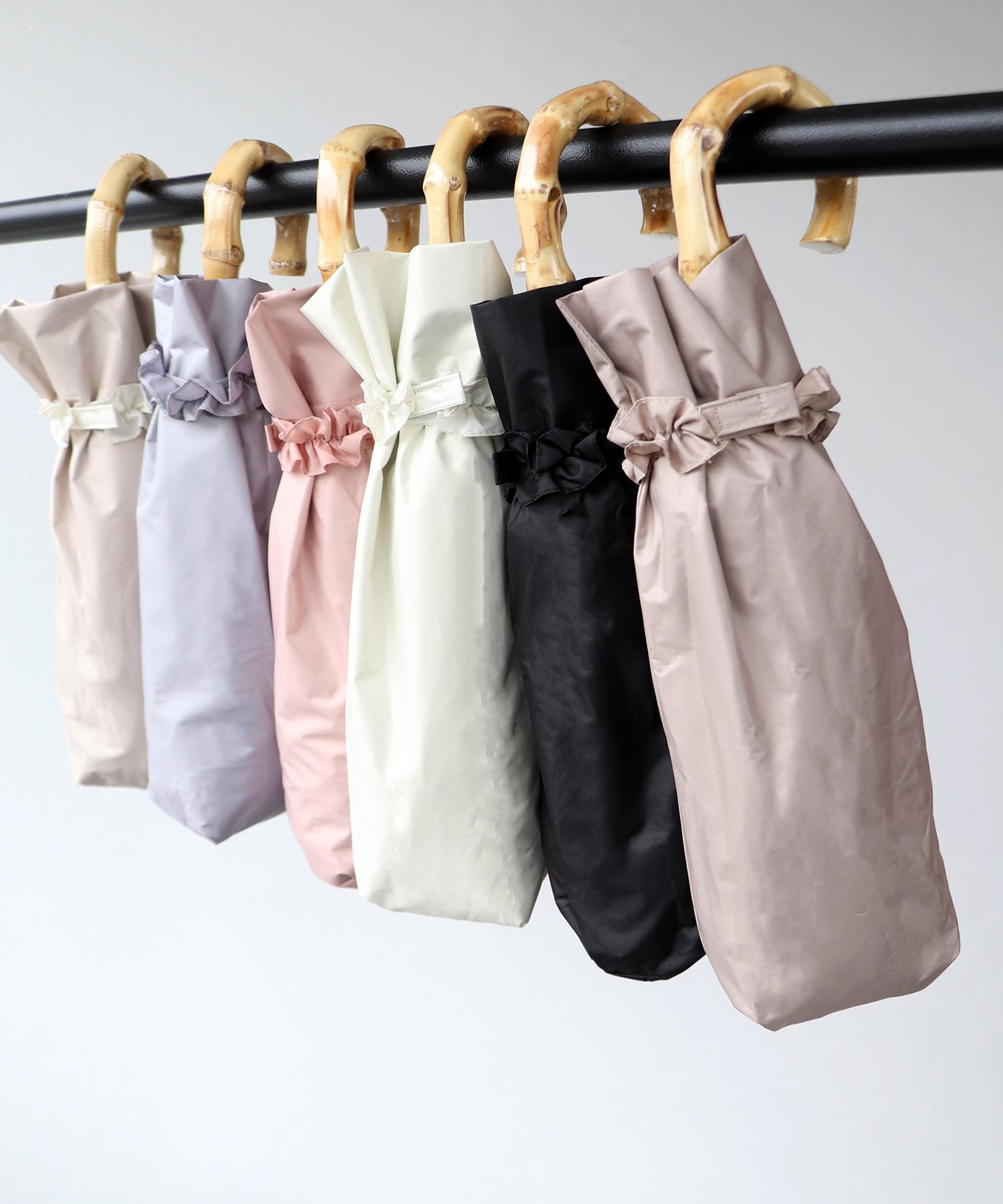 [CP日除け10%]【WEB限定】【pink trick】フリル完全遮光2段折傘(晴雨兼用)