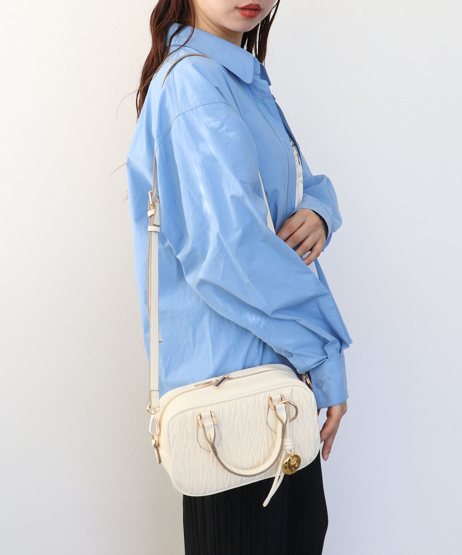 チャーム付きキルト柄ミニボストンバッグ