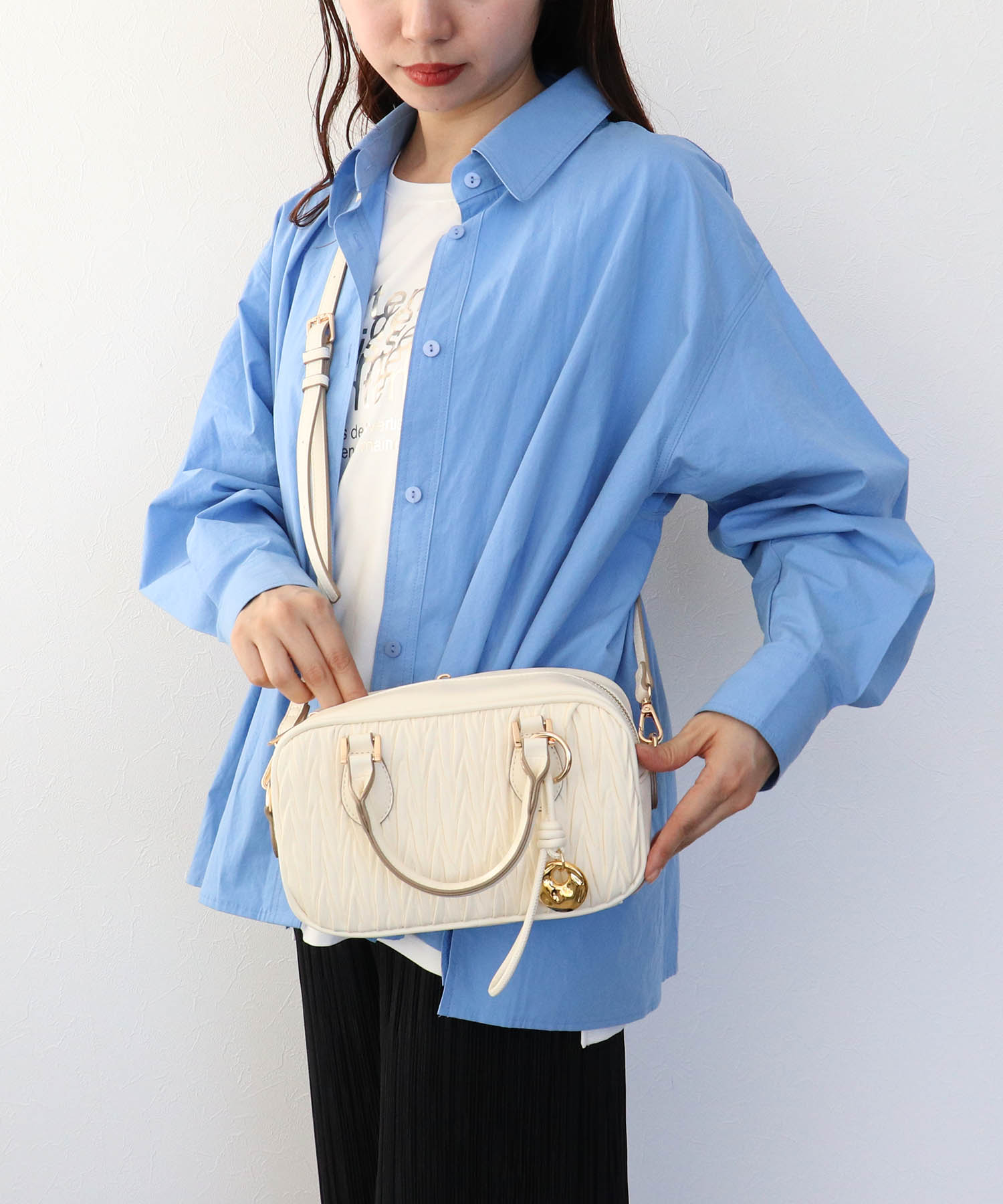 チャーム付きキルト柄ミニボストンバッグ