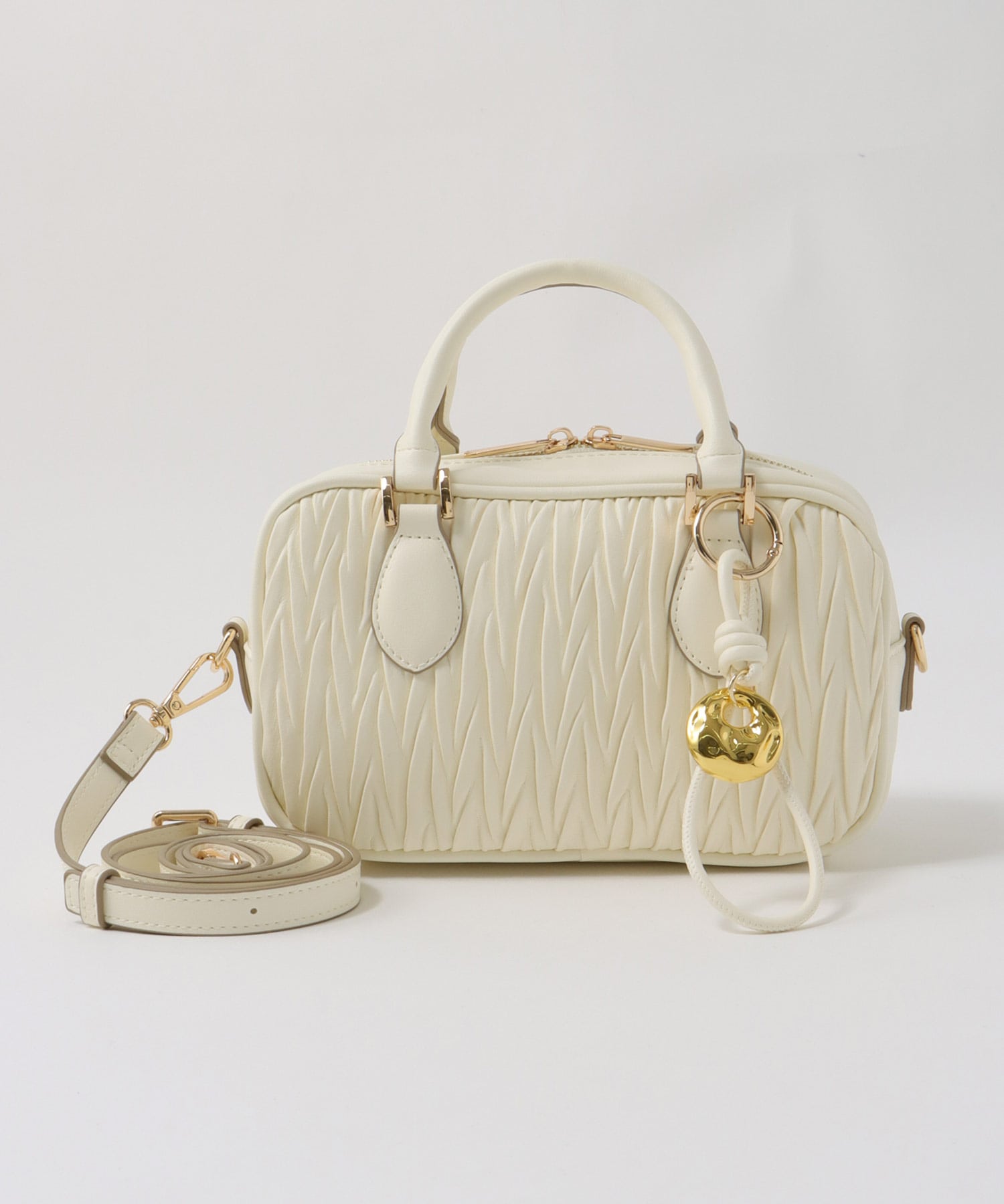 チャーム付きキルト柄ミニボストンバッグ