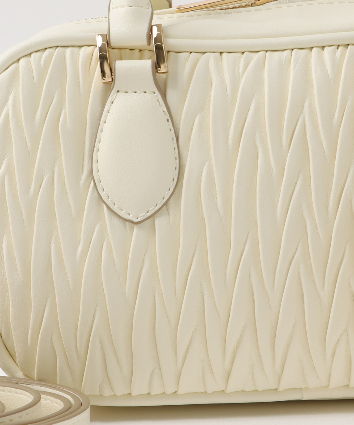 チャーム付きキルト柄ミニボストンバッグ