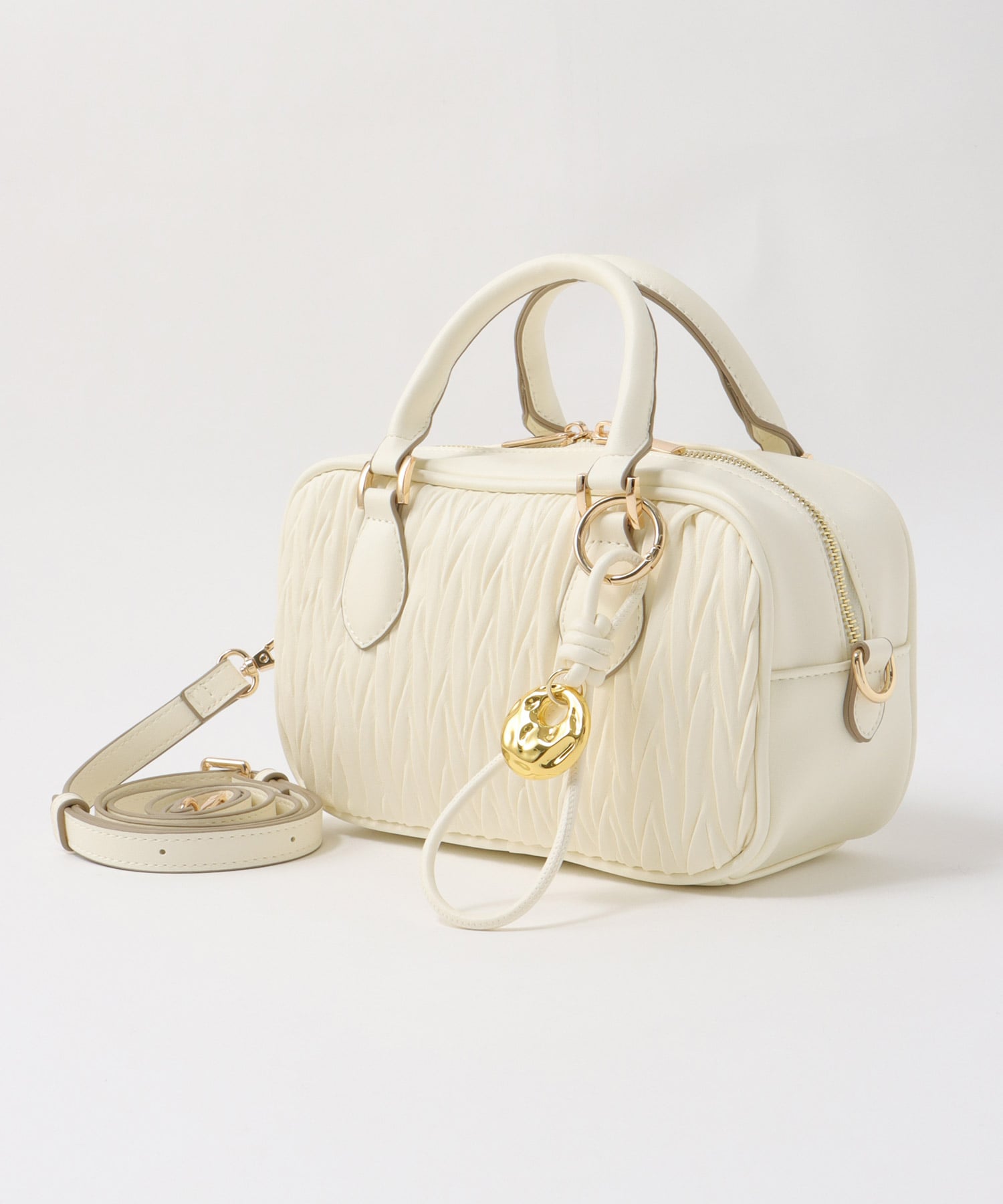 チャーム付きキルト柄ミニボストンバッグ