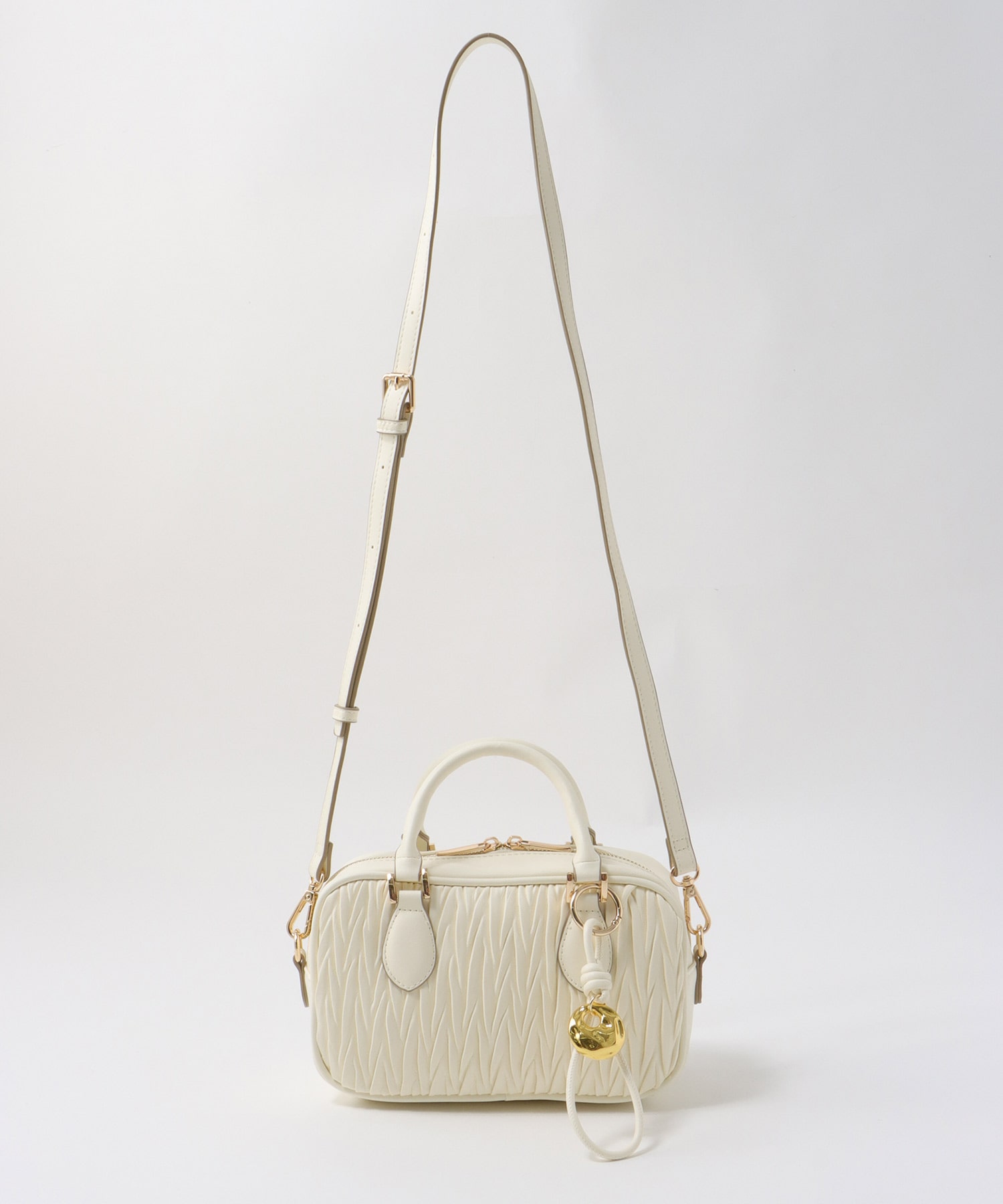 チャーム付きキルト柄ミニボストンバッグ