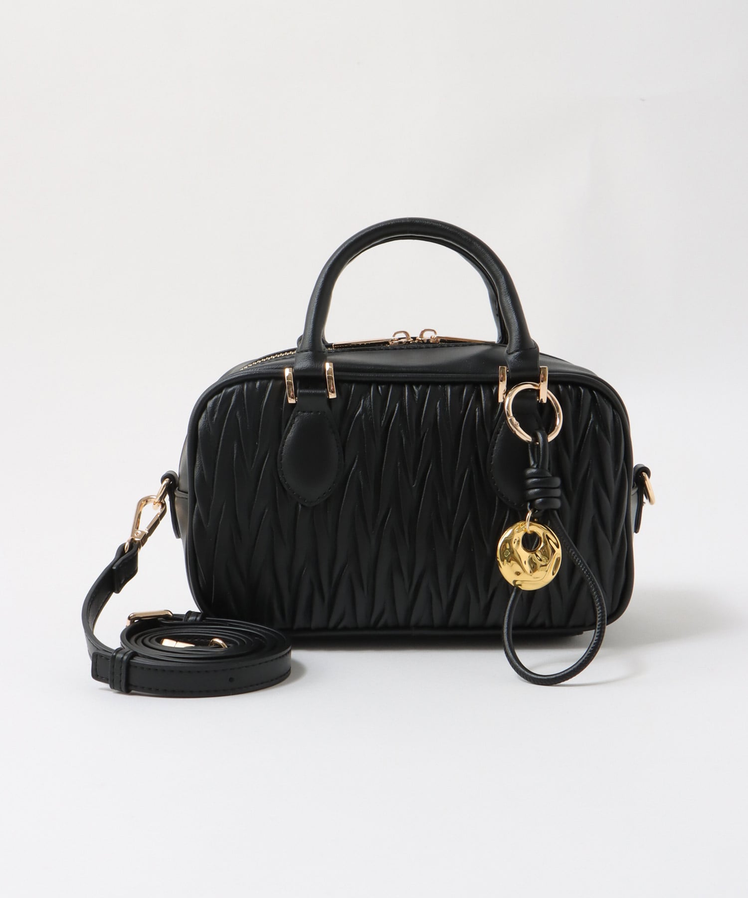 チャーム付きキルト柄ミニボストンバッグ