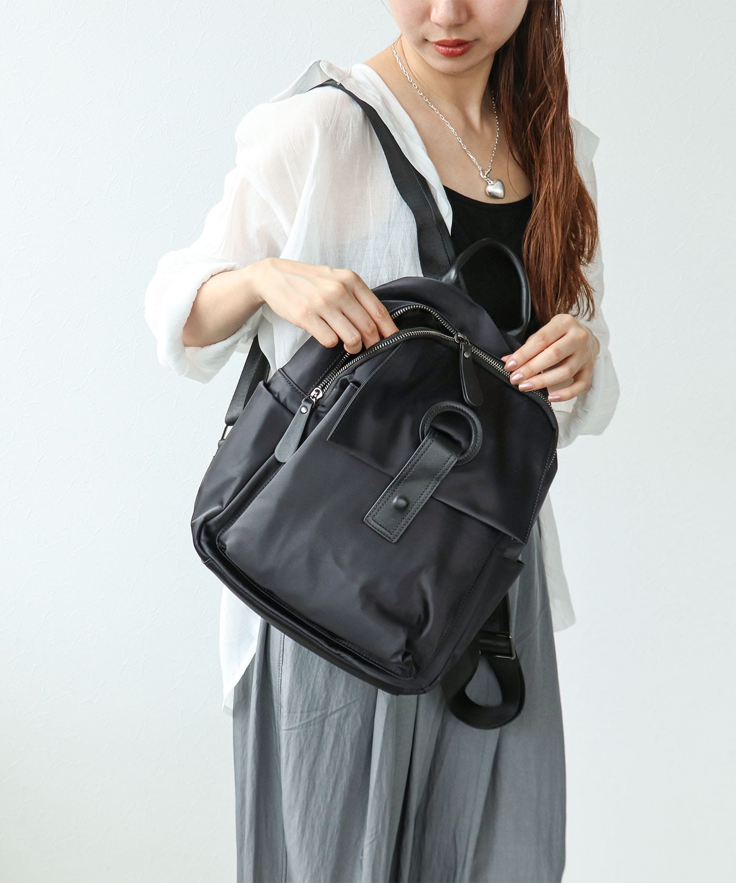 牛革×ナイロンフラップリュック