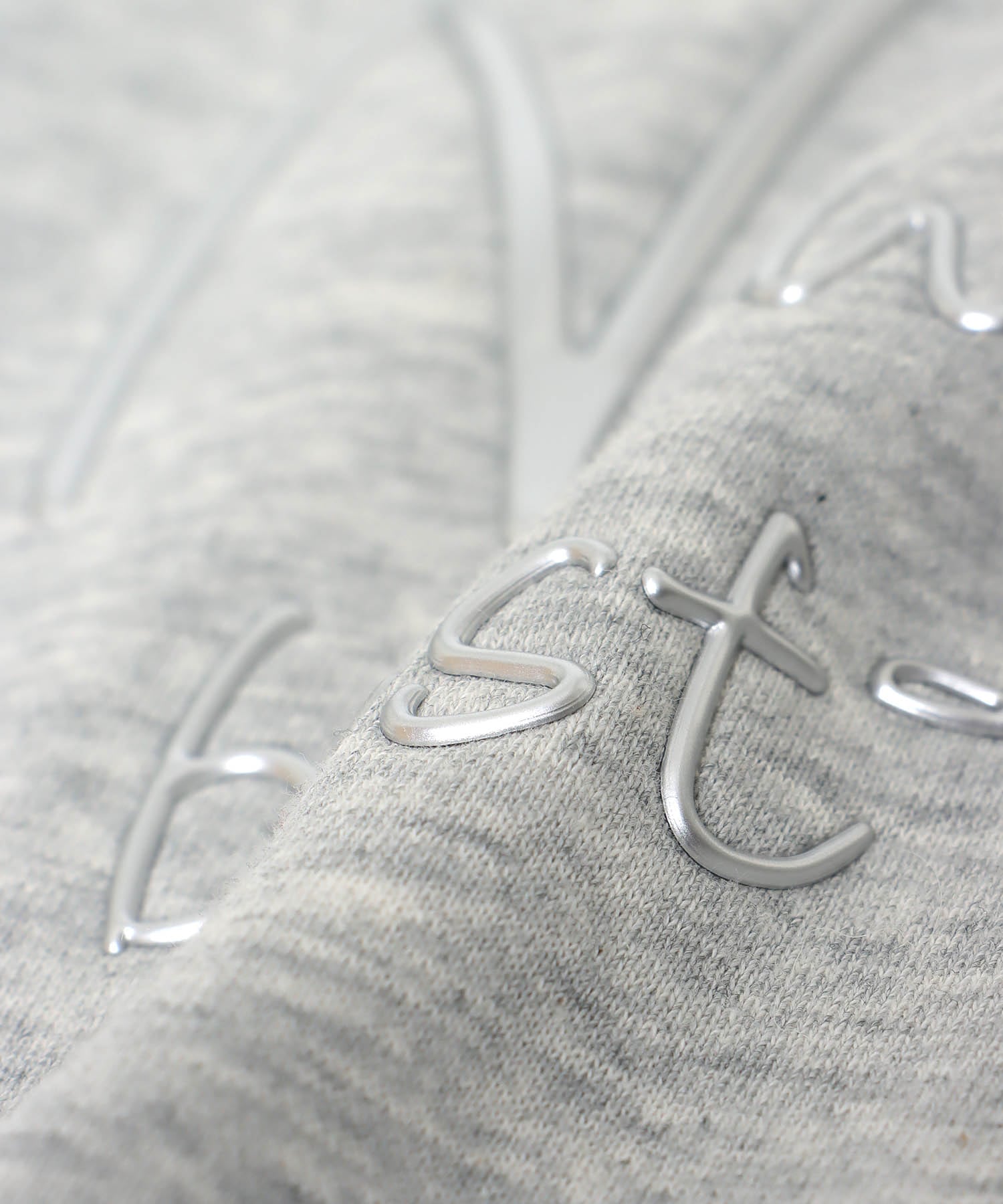 金属エンボスバックファスナープルオーバー