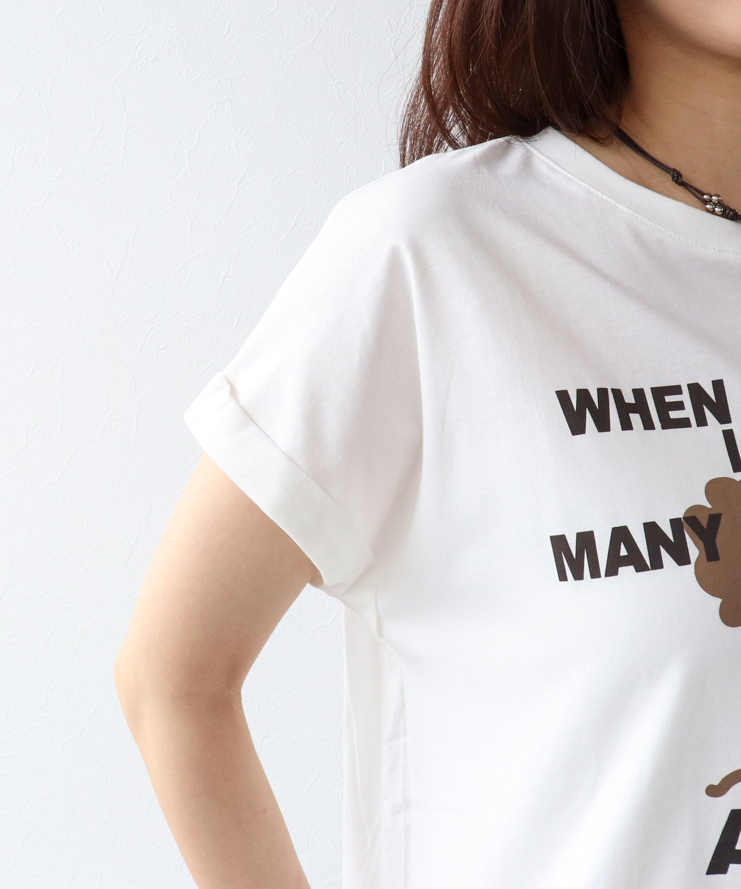 フェイスモチーフプリントドルマンTシャツ