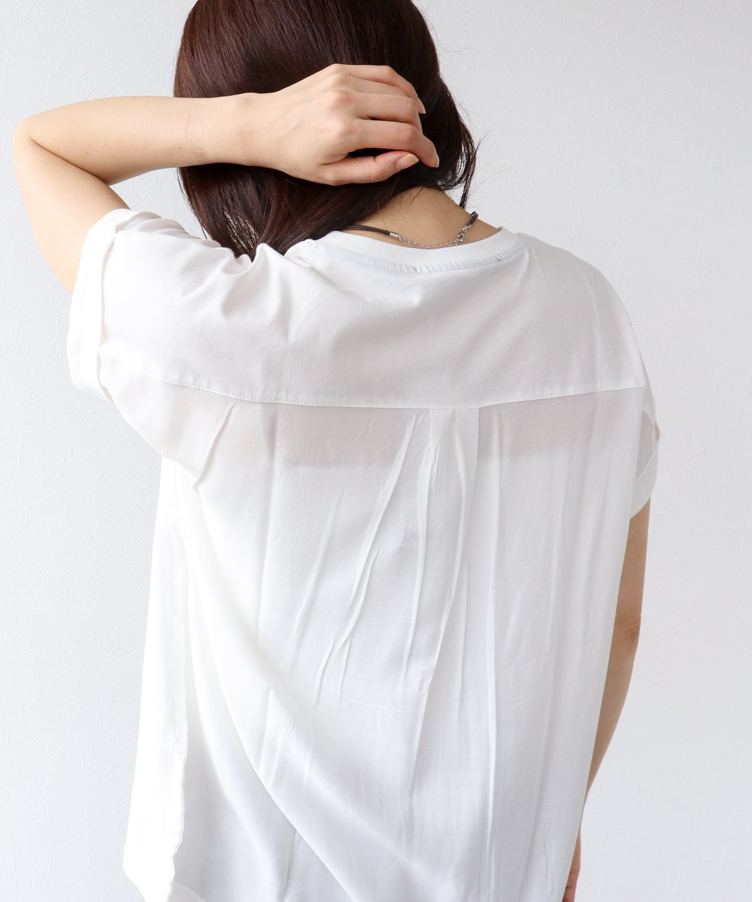 フェイスモチーフプリントドルマンTシャツ