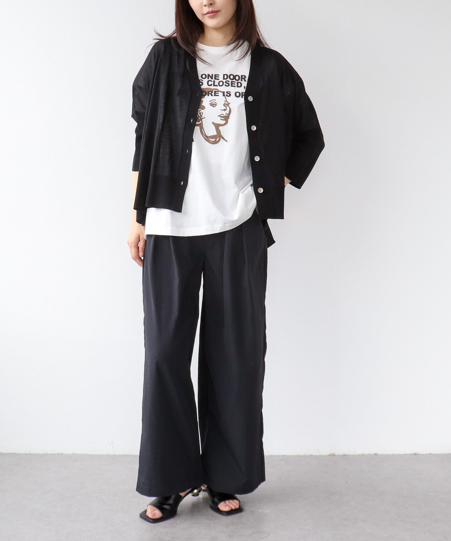 フェイスモチーフプリントドルマンTシャツ