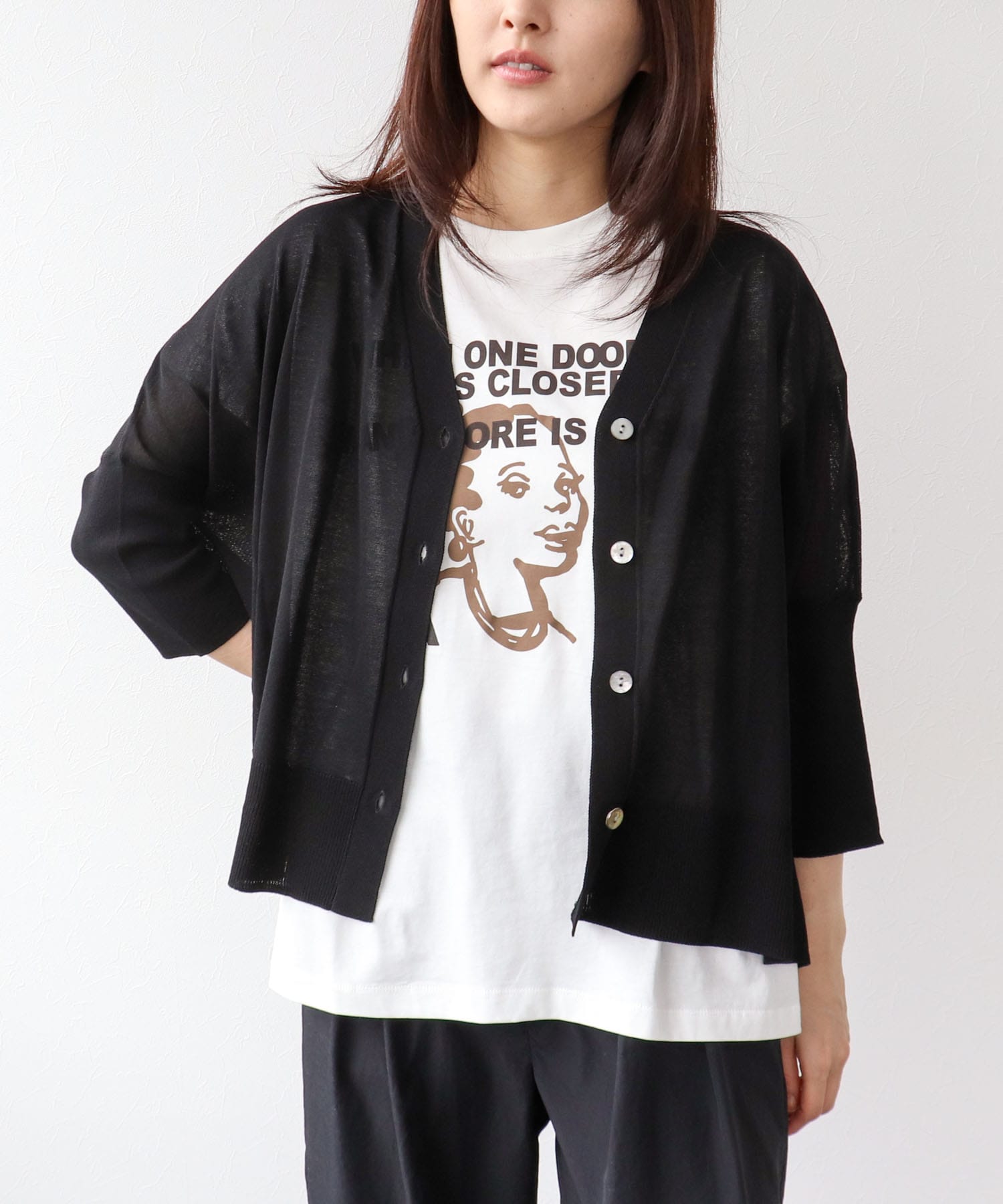 フェイスモチーフプリントドルマンTシャツ