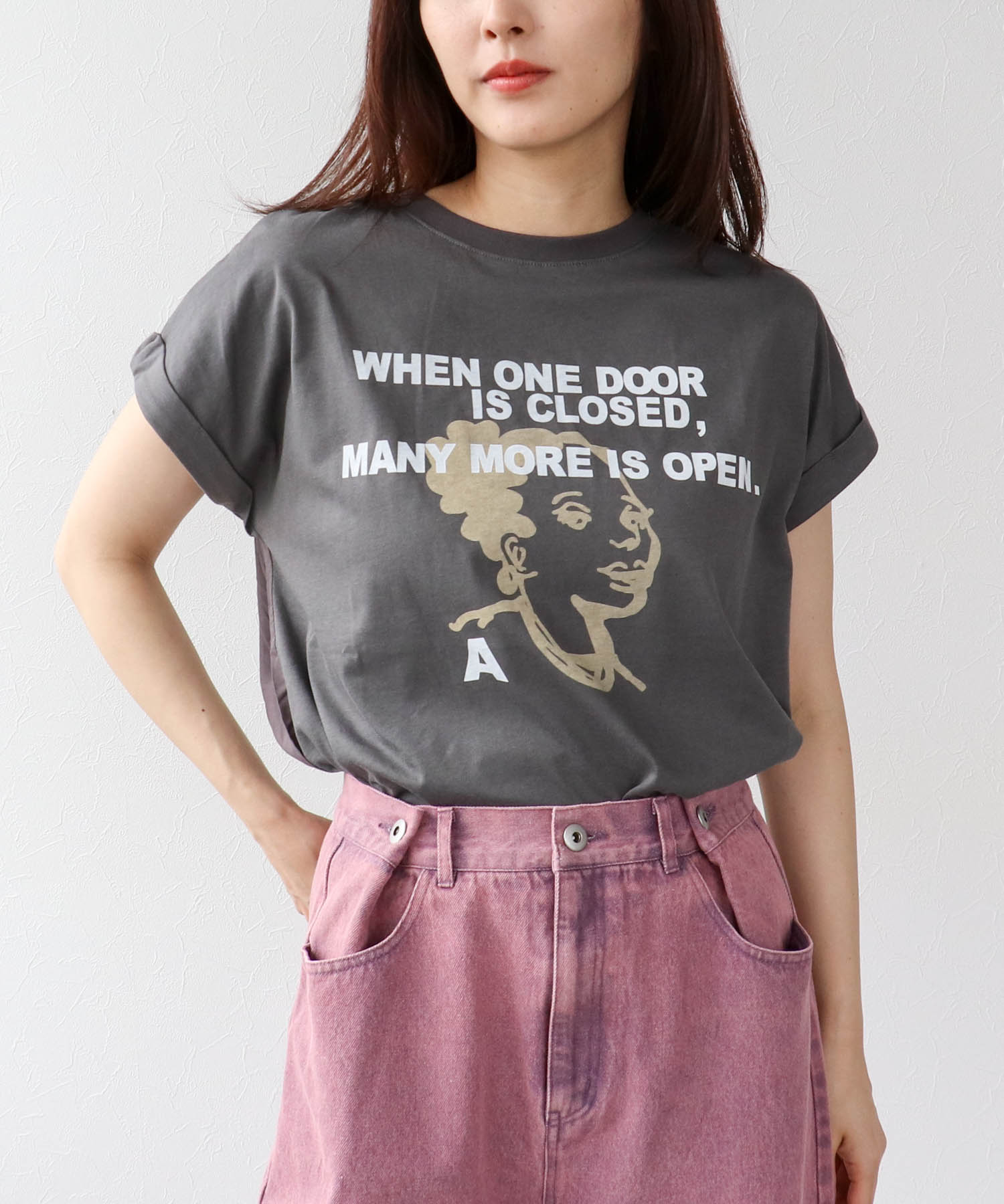 フェイスモチーフプリントドルマンTシャツ