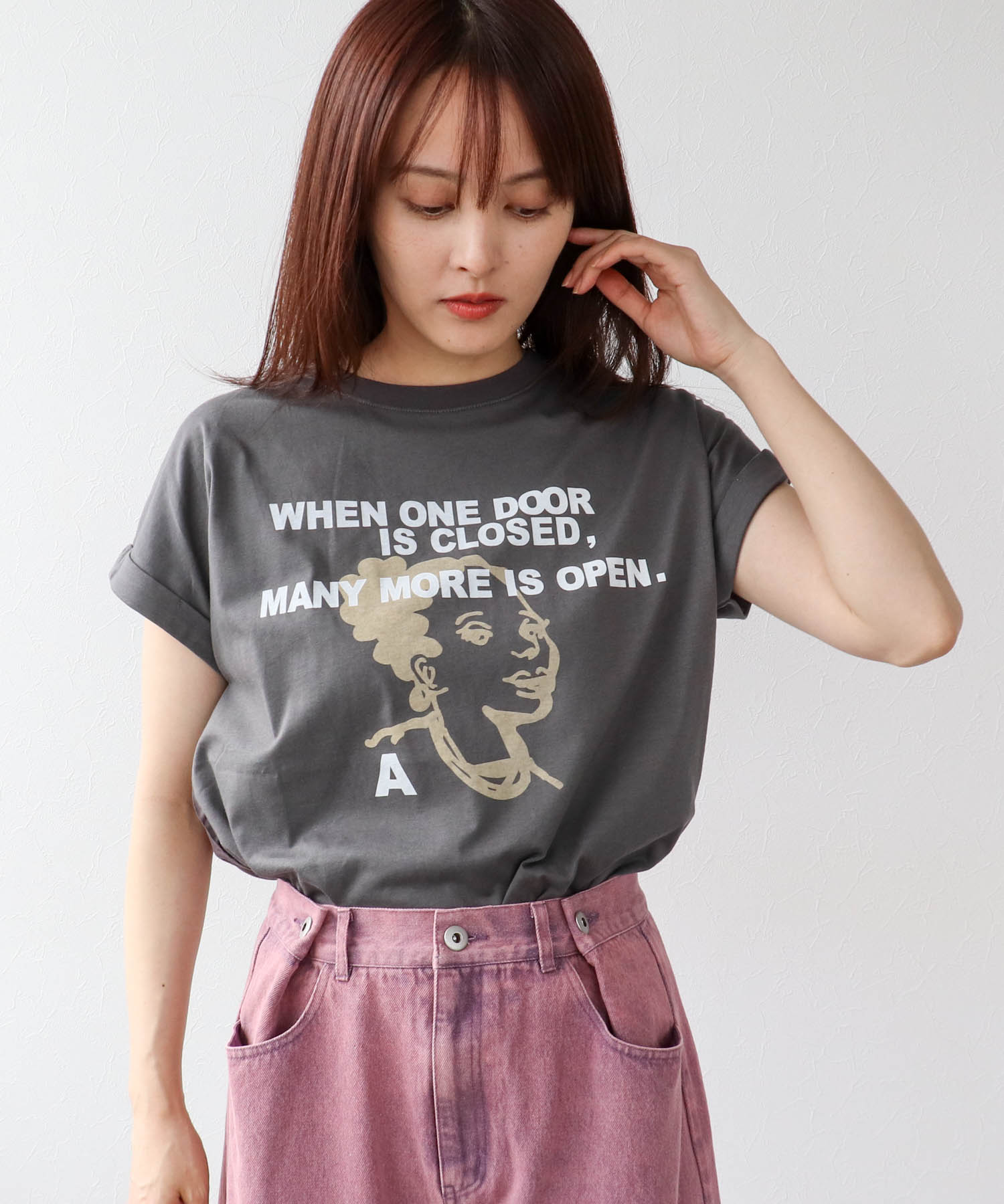 フェイスモチーフプリントドルマンTシャツ