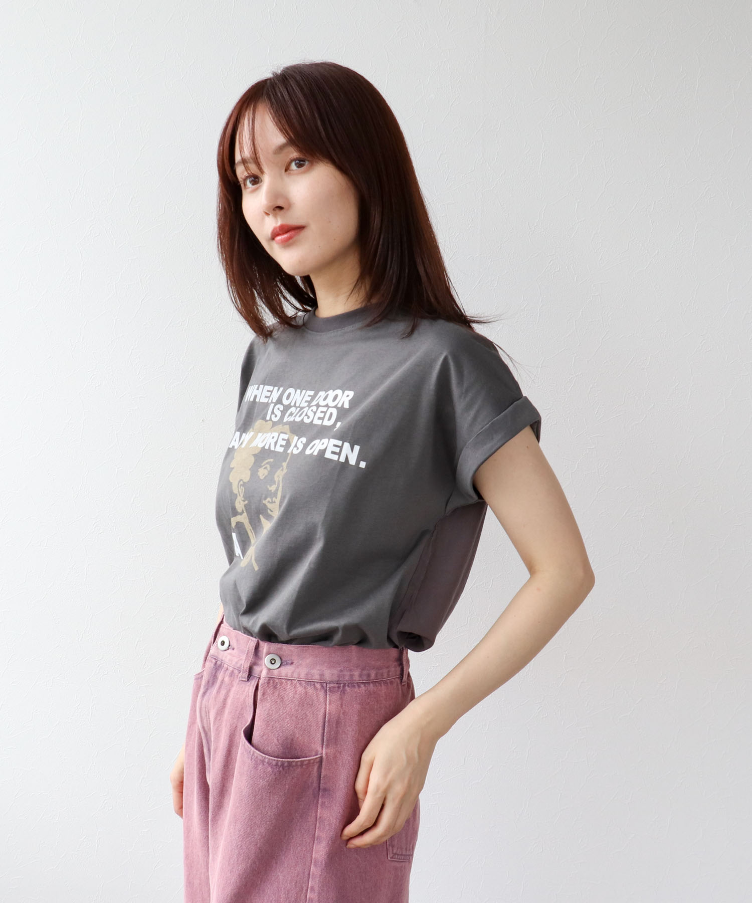 フェイスモチーフプリントドルマンTシャツ