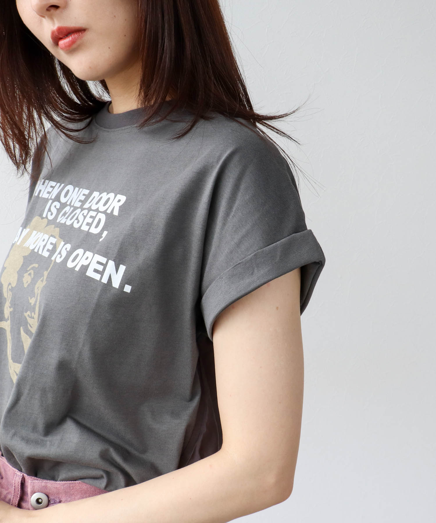 フェイスモチーフプリントドルマンTシャツ