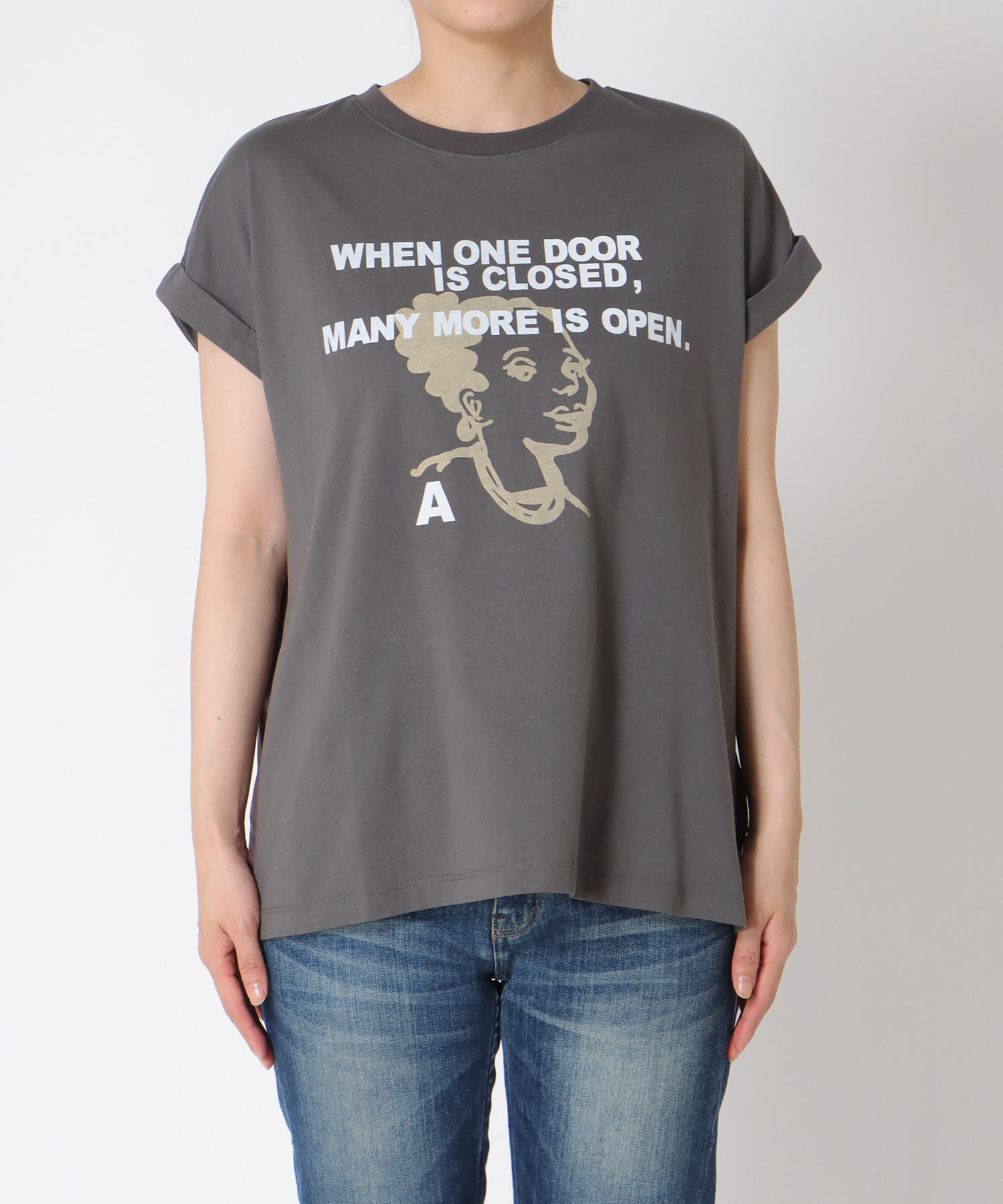 フェイスモチーフプリントドルマンTシャツ