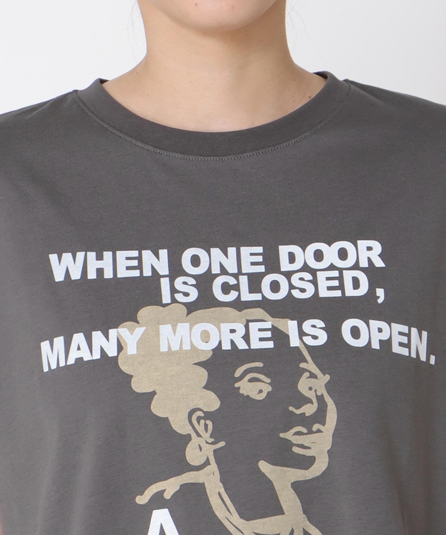 フェイスモチーフプリントドルマンTシャツ
