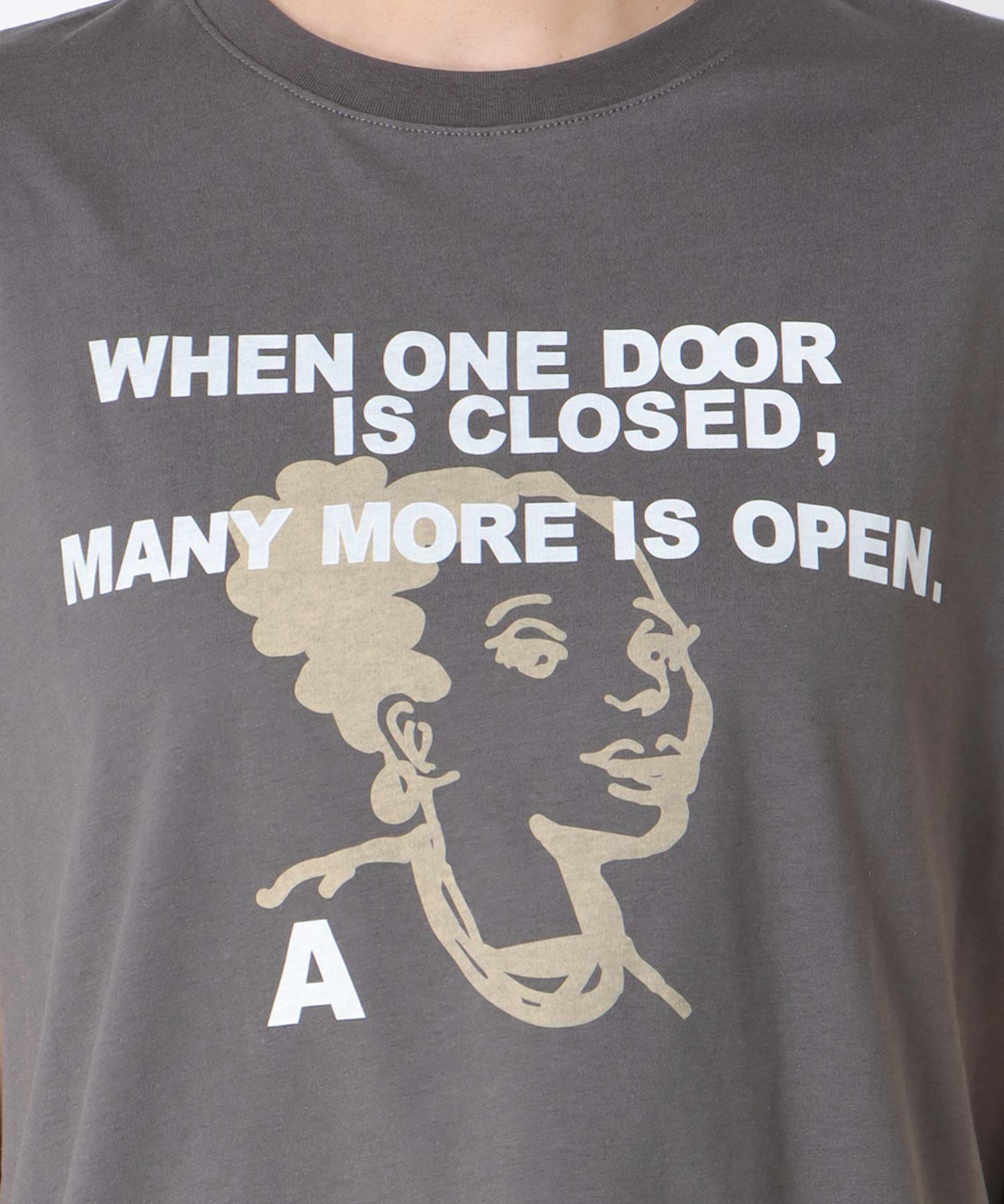 フェイスモチーフプリントドルマンTシャツ