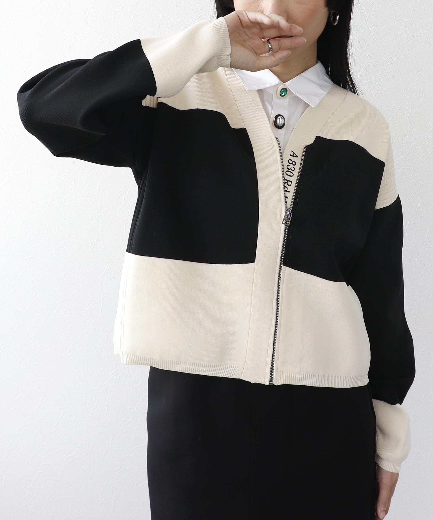 超軽量編柄ロゴZIPブルゾン