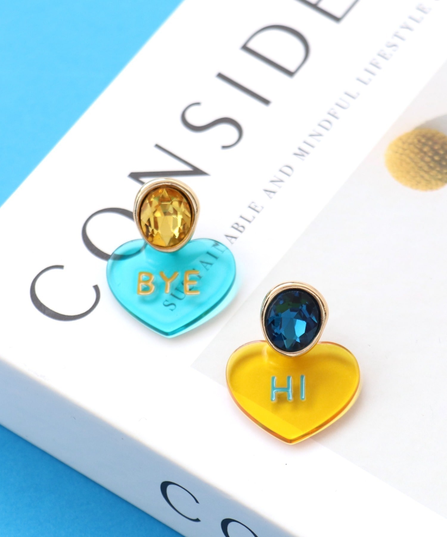 Hi/BYEクリアハートピアス