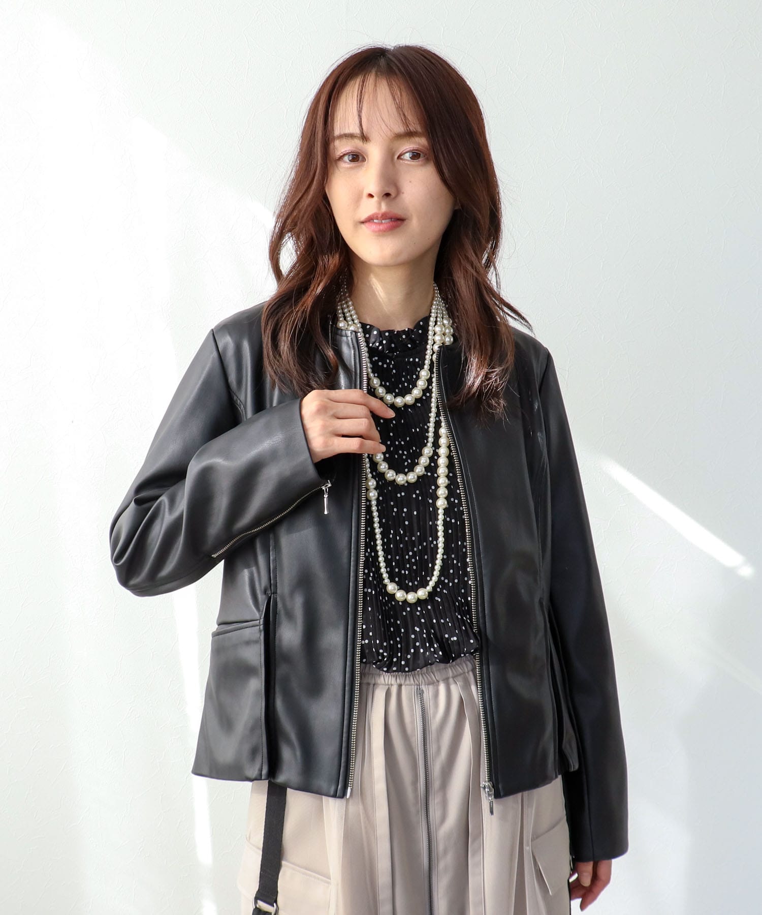 ペプラムフェイクレザージャケット
