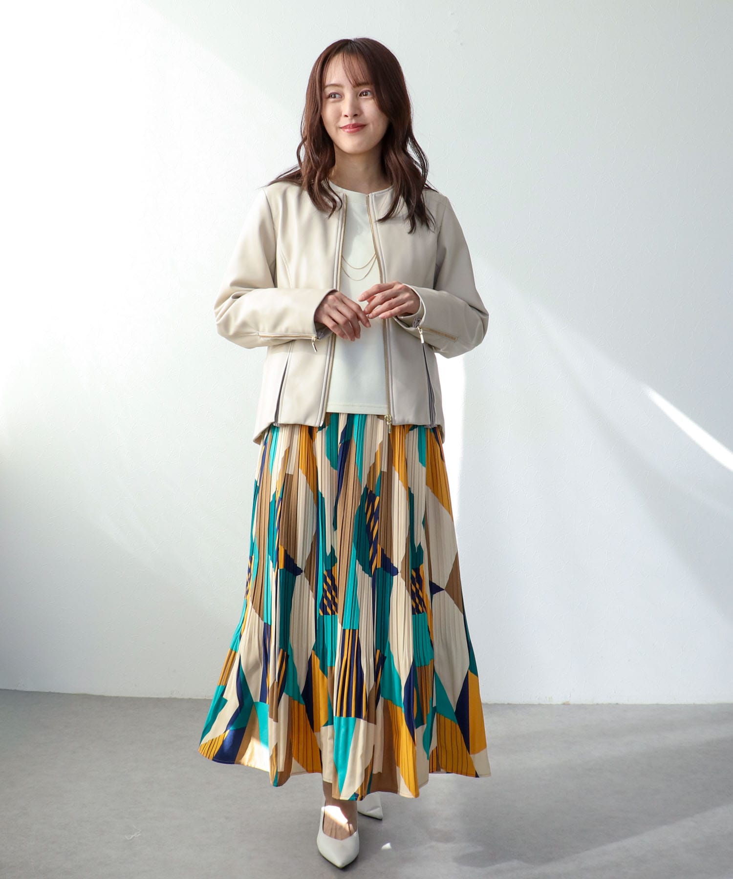 ペプラムフェイクレザージャケット