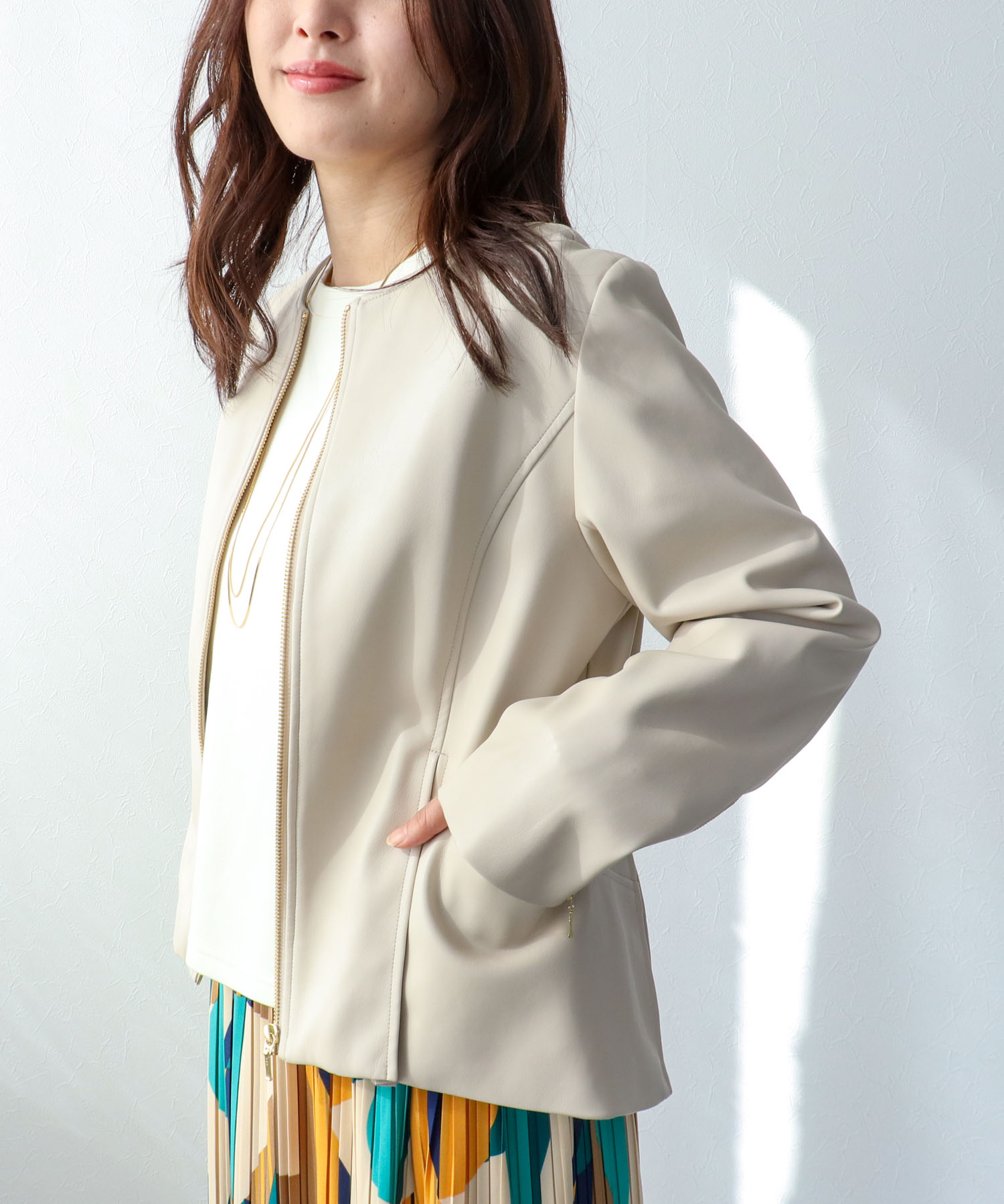 ペプラムフェイクレザージャケット