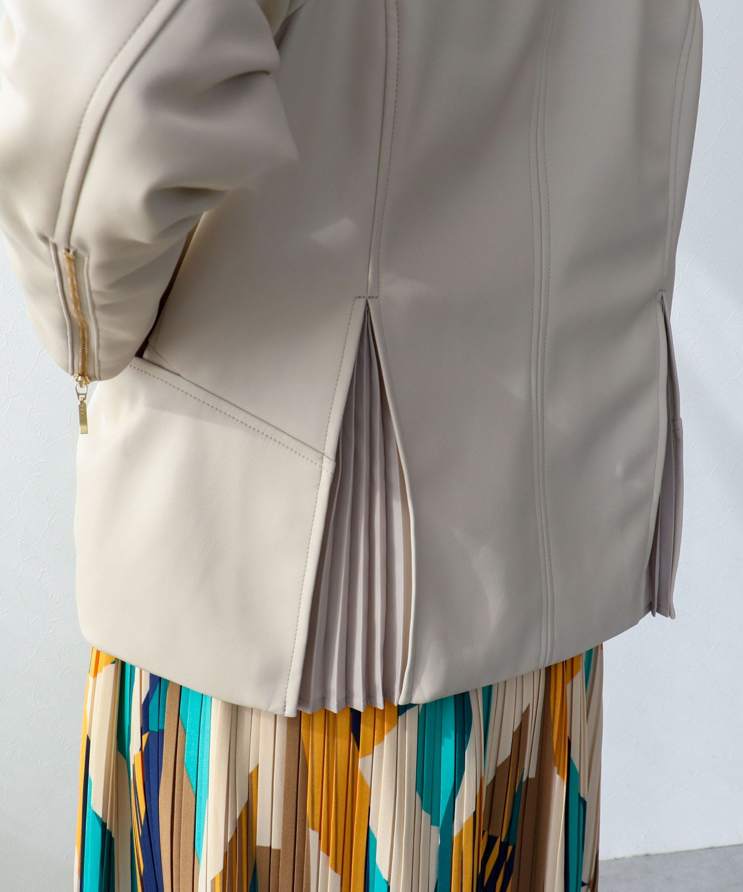 ペプラムフェイクレザージャケット