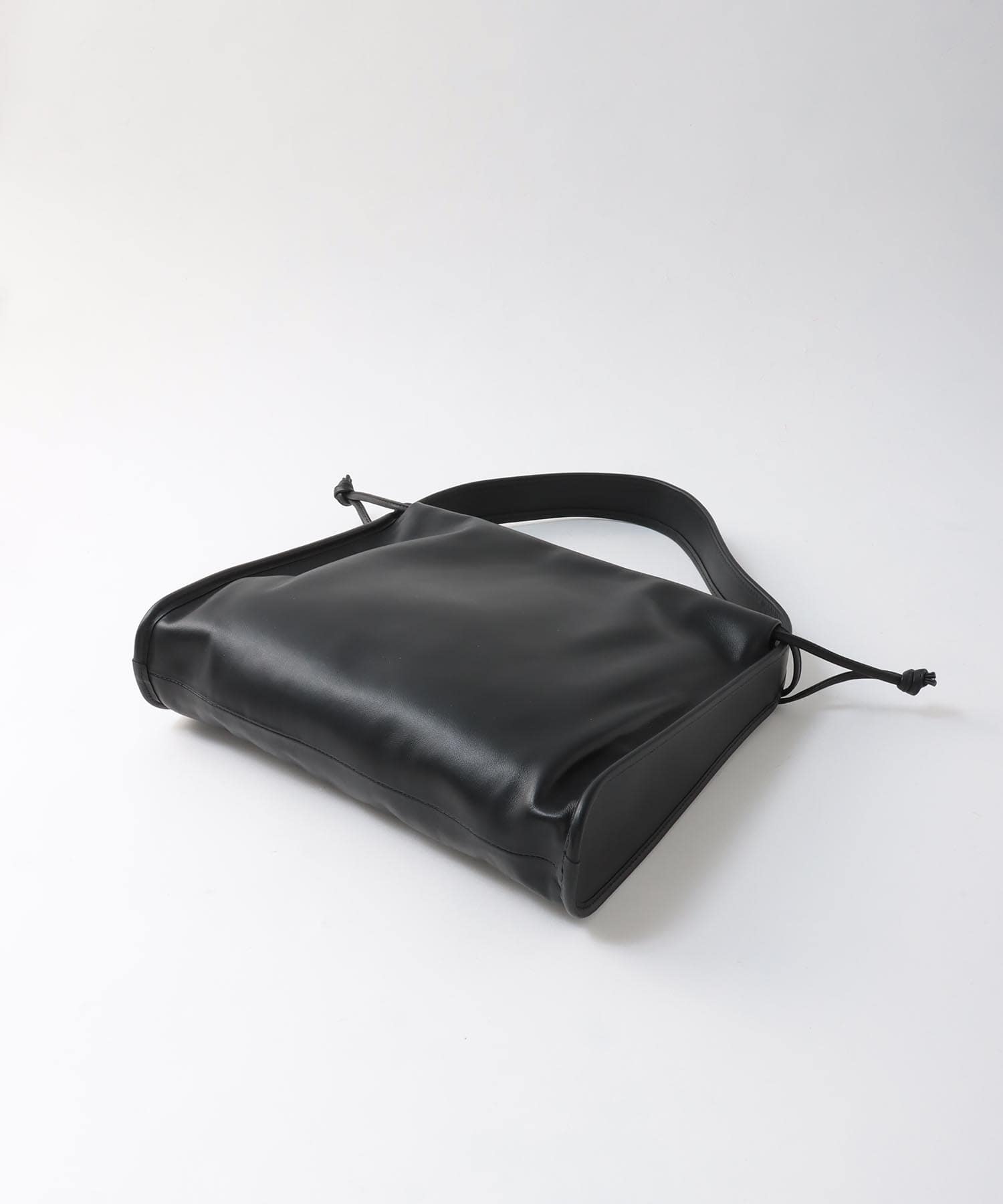 ＜CHRISTIAN VILLA＞reversible purse bag