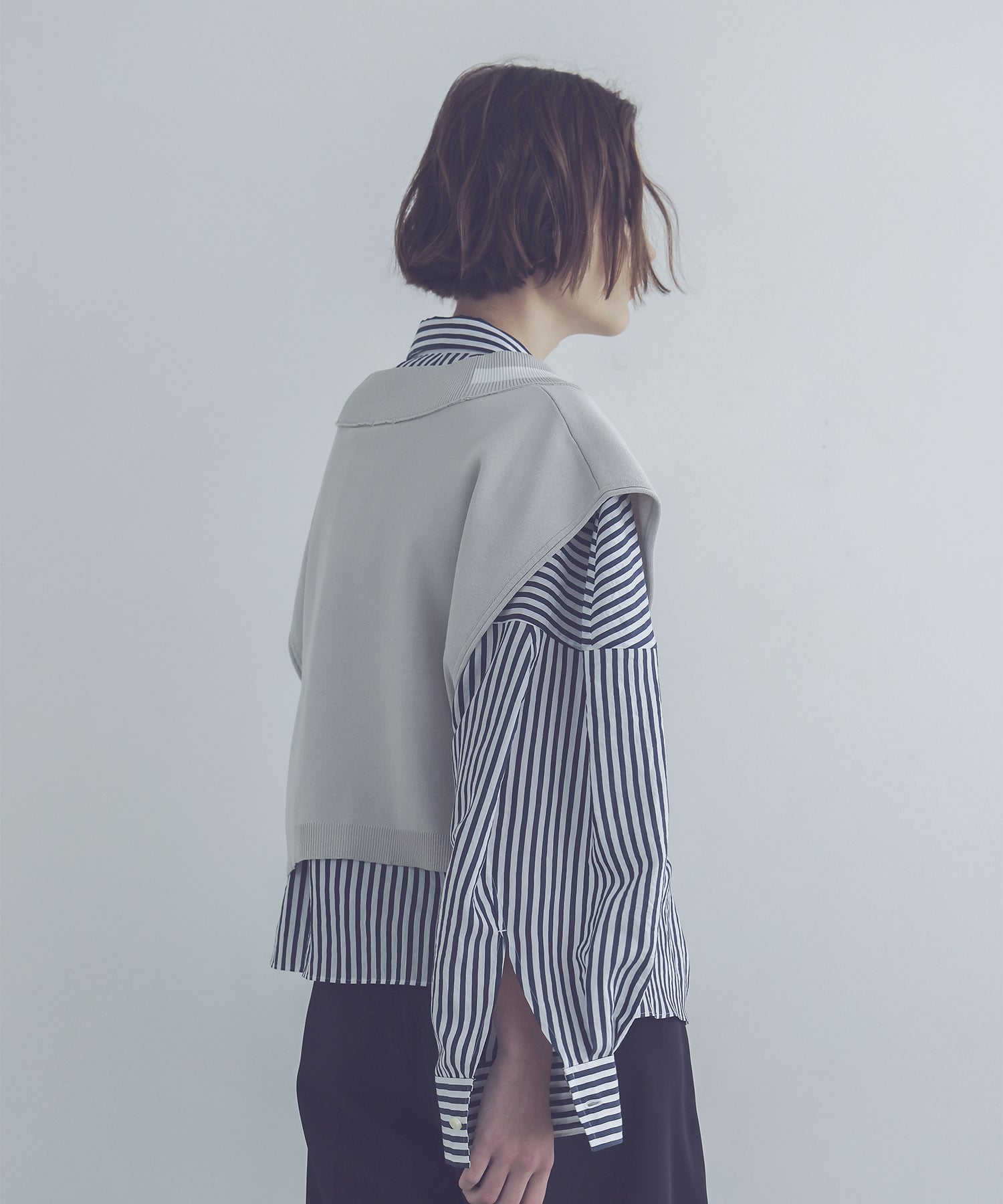 white line V neck vest