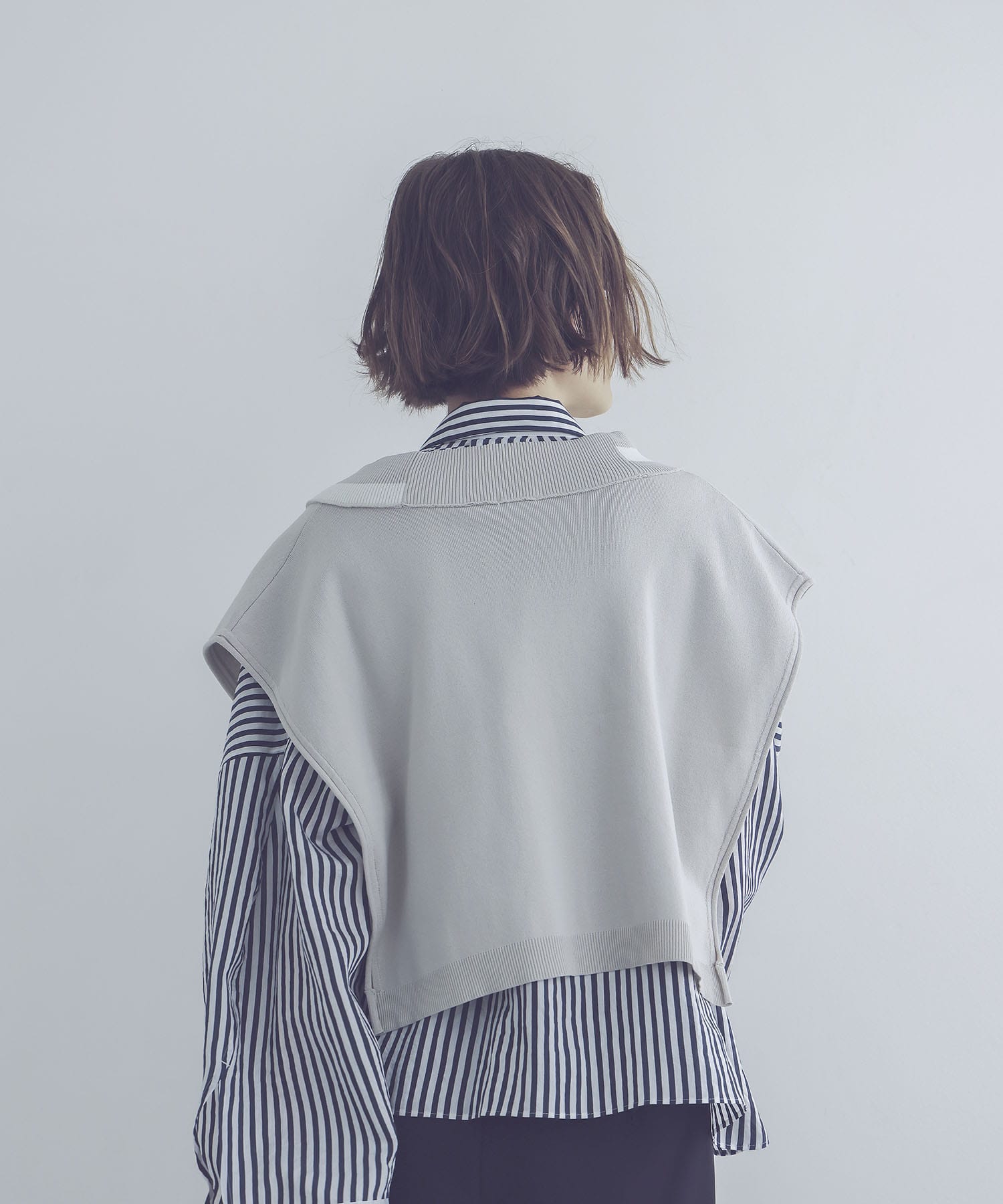 white line V neck vest