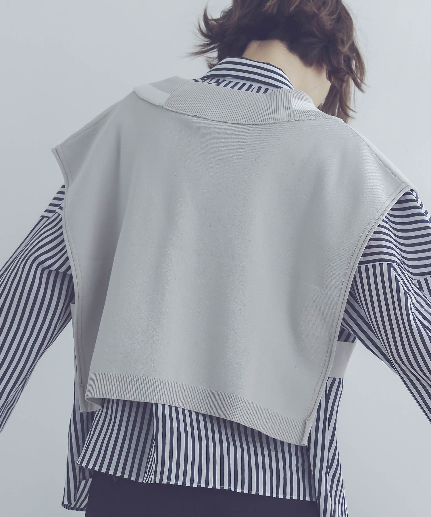 white line V neck vest