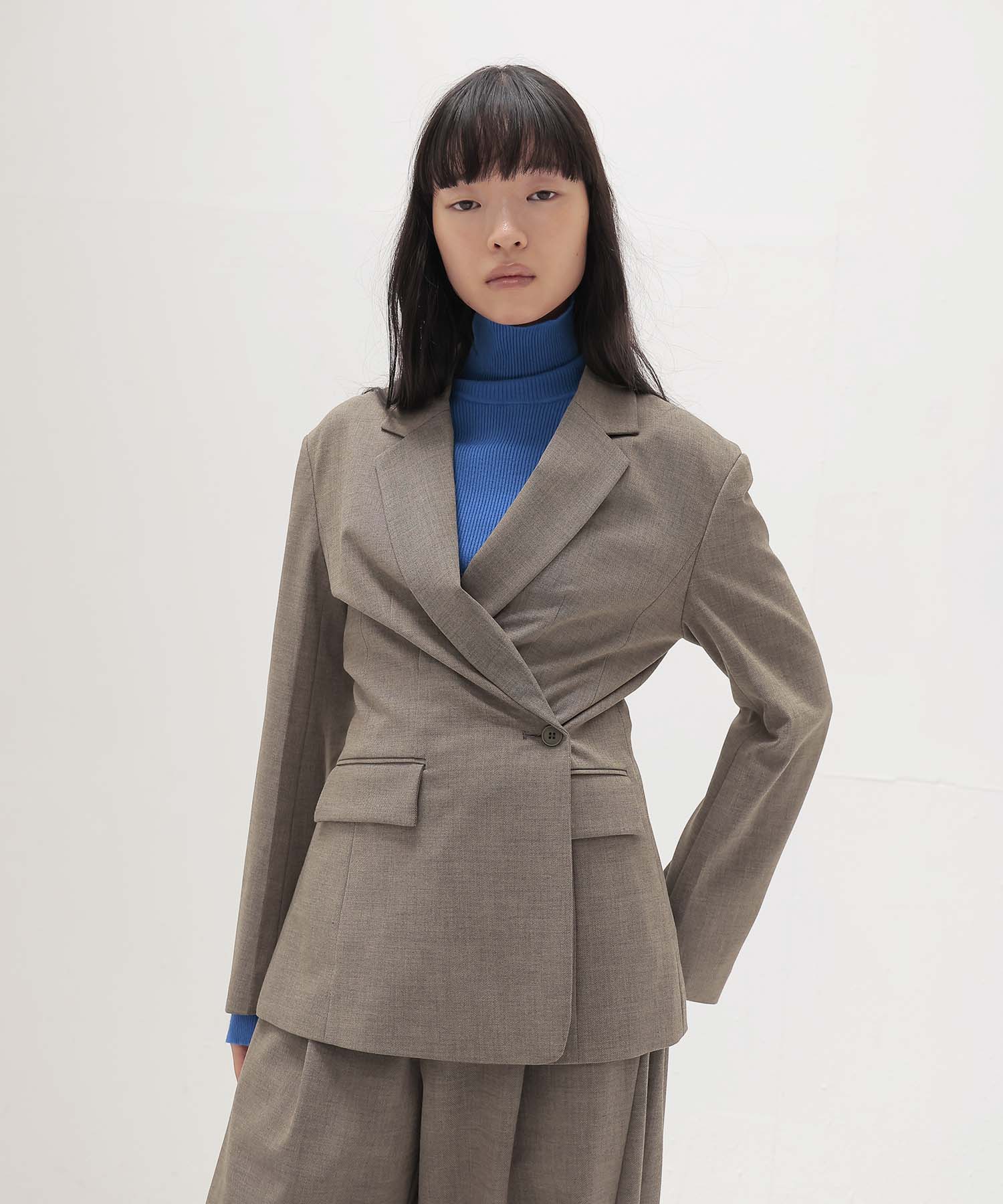 playful asymmetric blazer