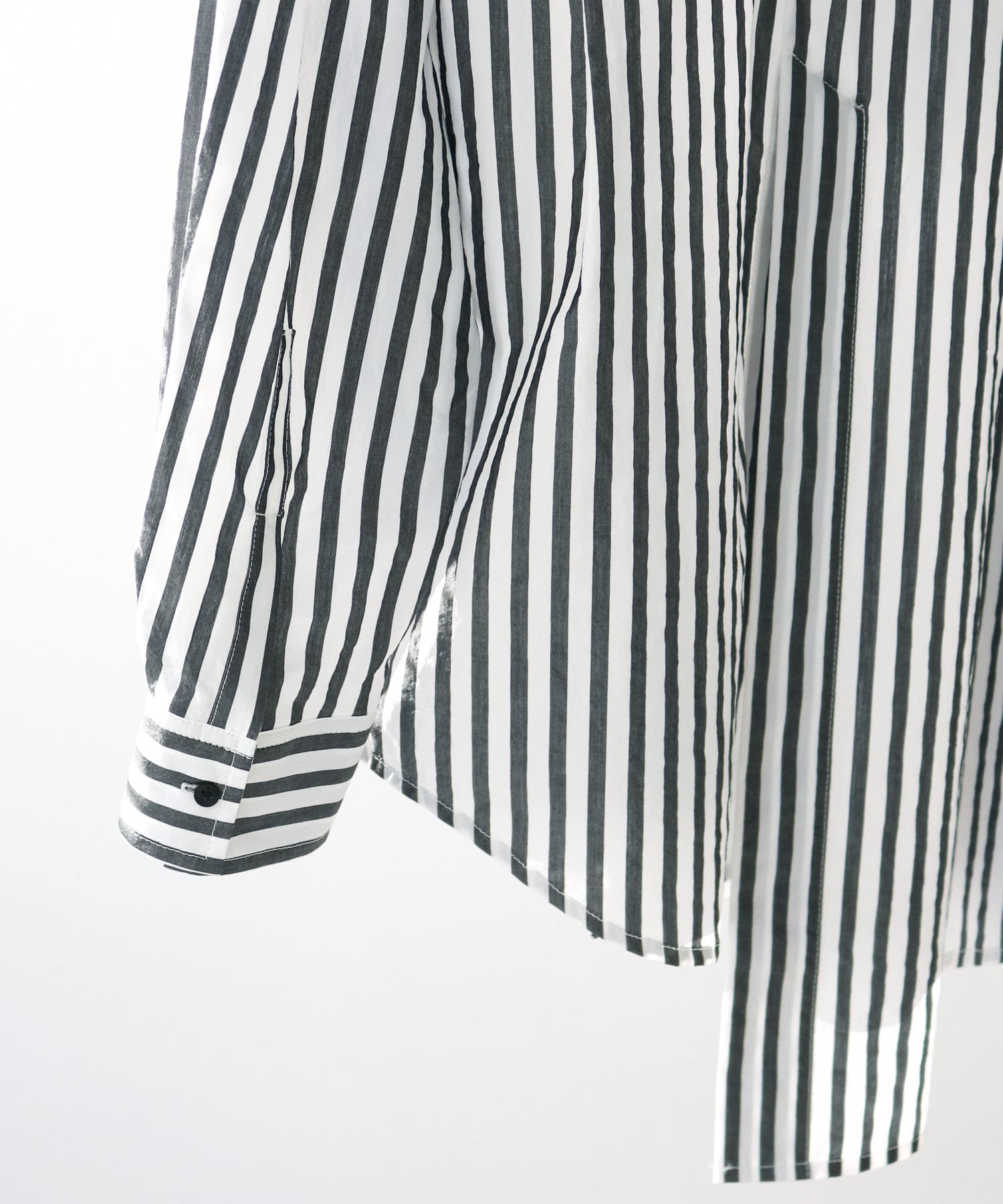 asymmetric stripe over shirt